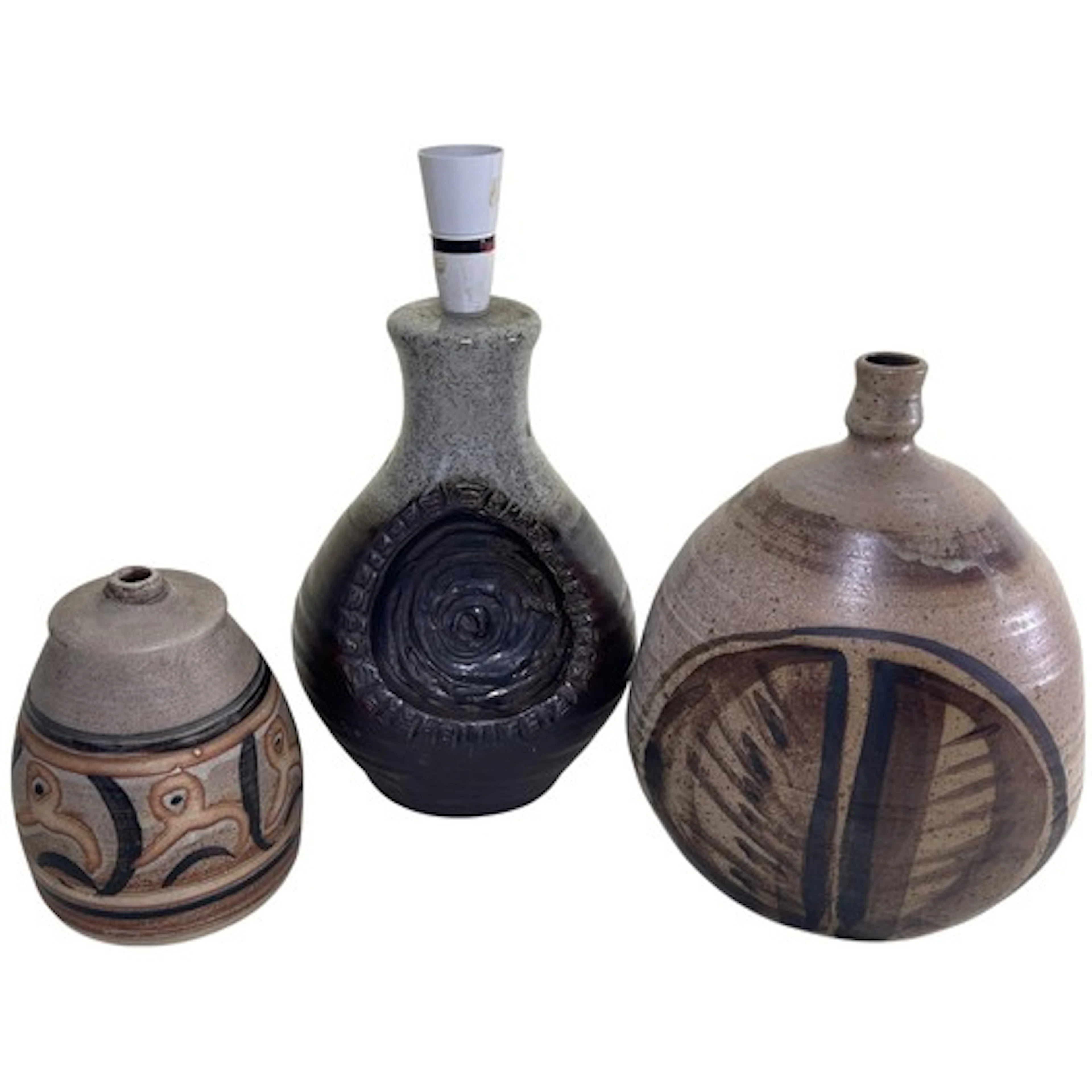 Three mid-century studio pottery lamps, with abstract painte...