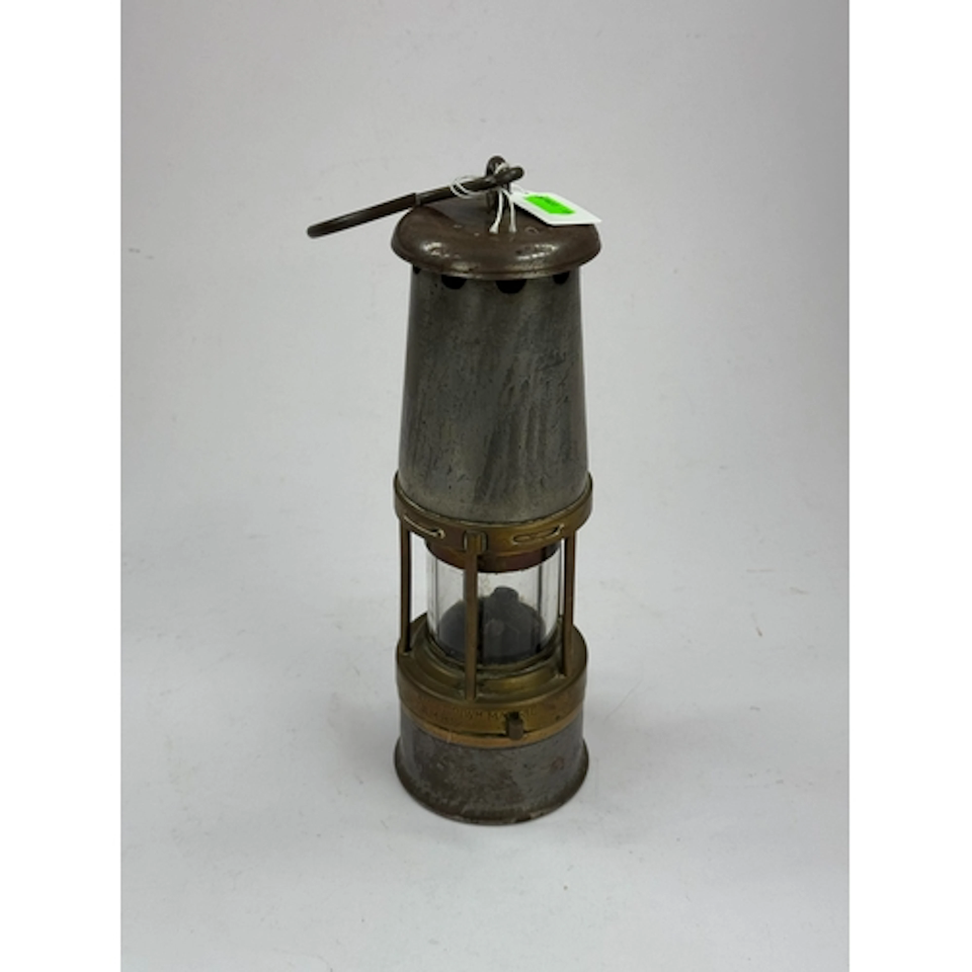 Social History: a brass and steel miners lamp by William Mor...