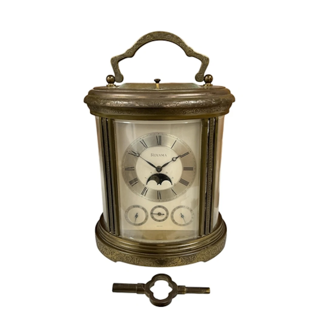 A reproduction engraved lacquered brass 'Royama' repeating c...