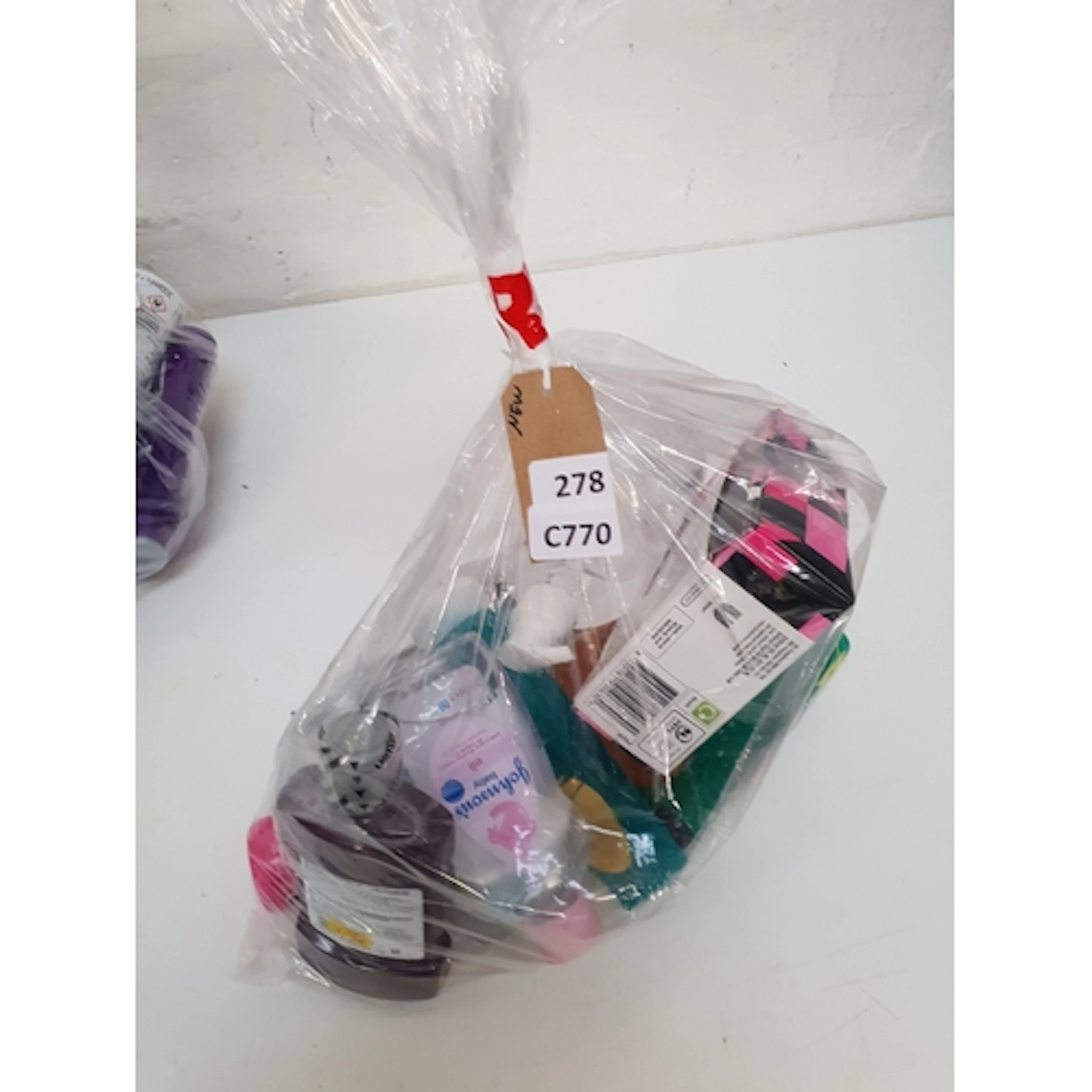 ONE BAG OF NEW AND USED COSMETICS Including Lynx, Johnsons,...