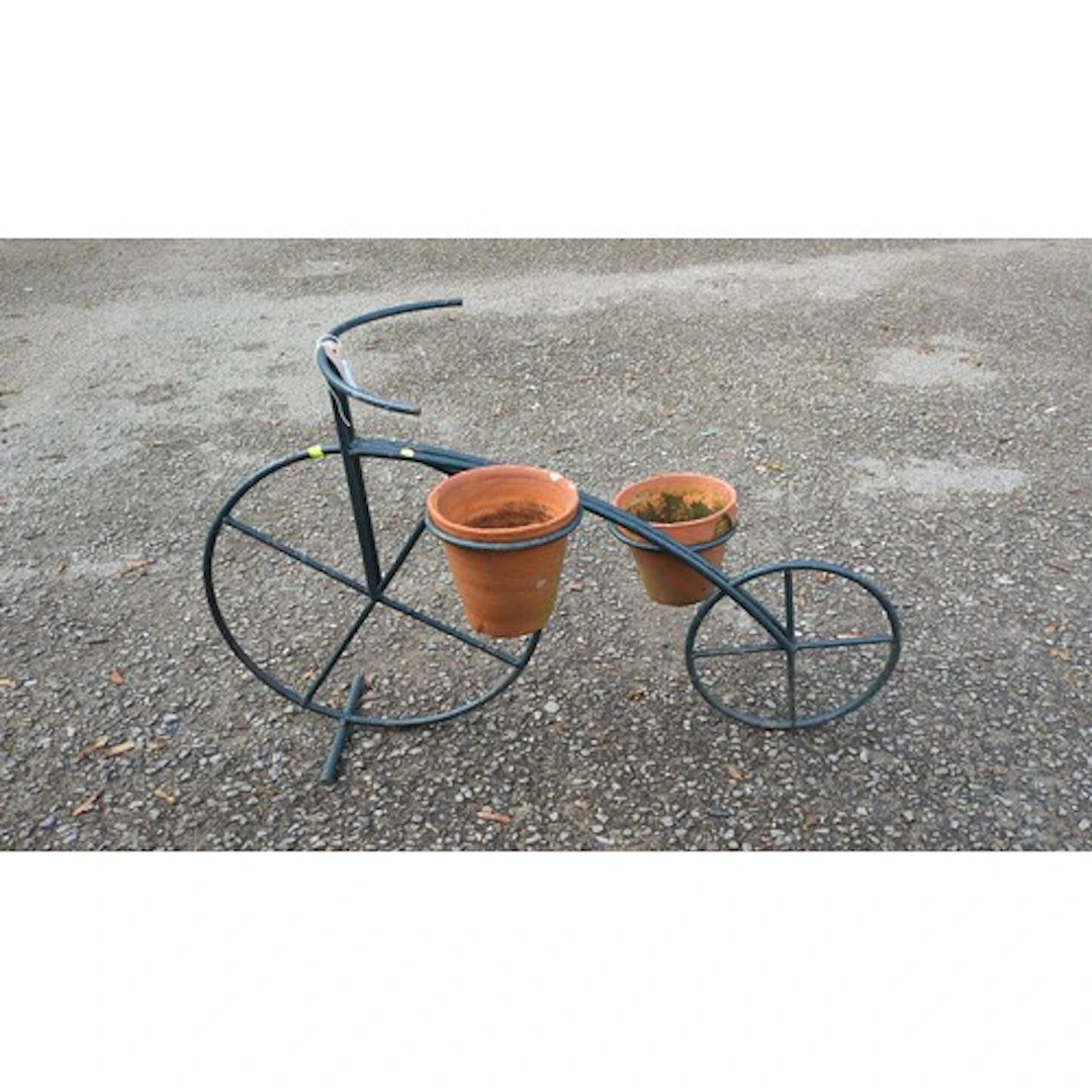 Bicycle-form garden planter in painted tubular metal, with s...