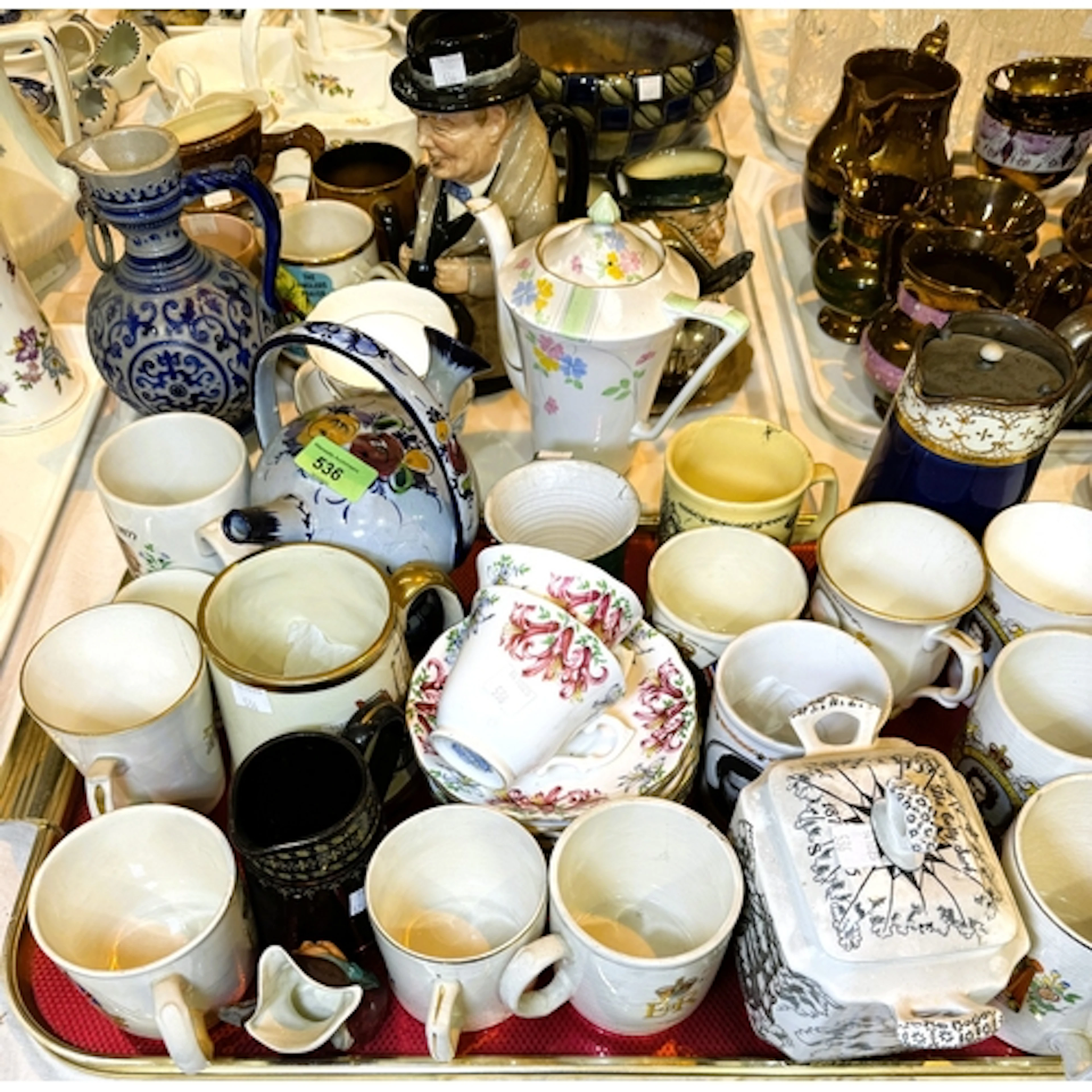 A WWI 1919 Anglesey commemorative peace mug and a collection...