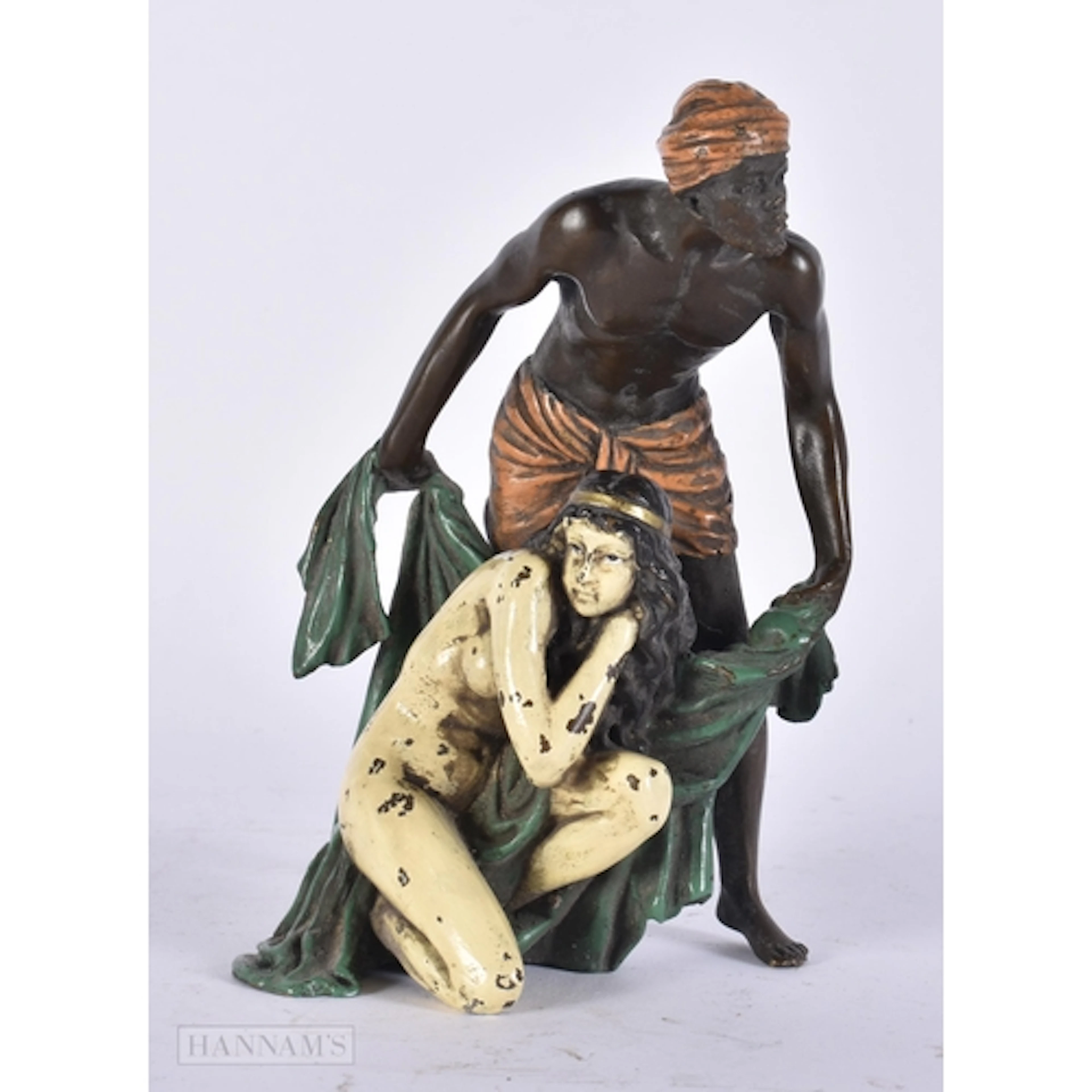 A COLD PAINTED BRONZE EROTIC FIGURE. 14 cm high.
