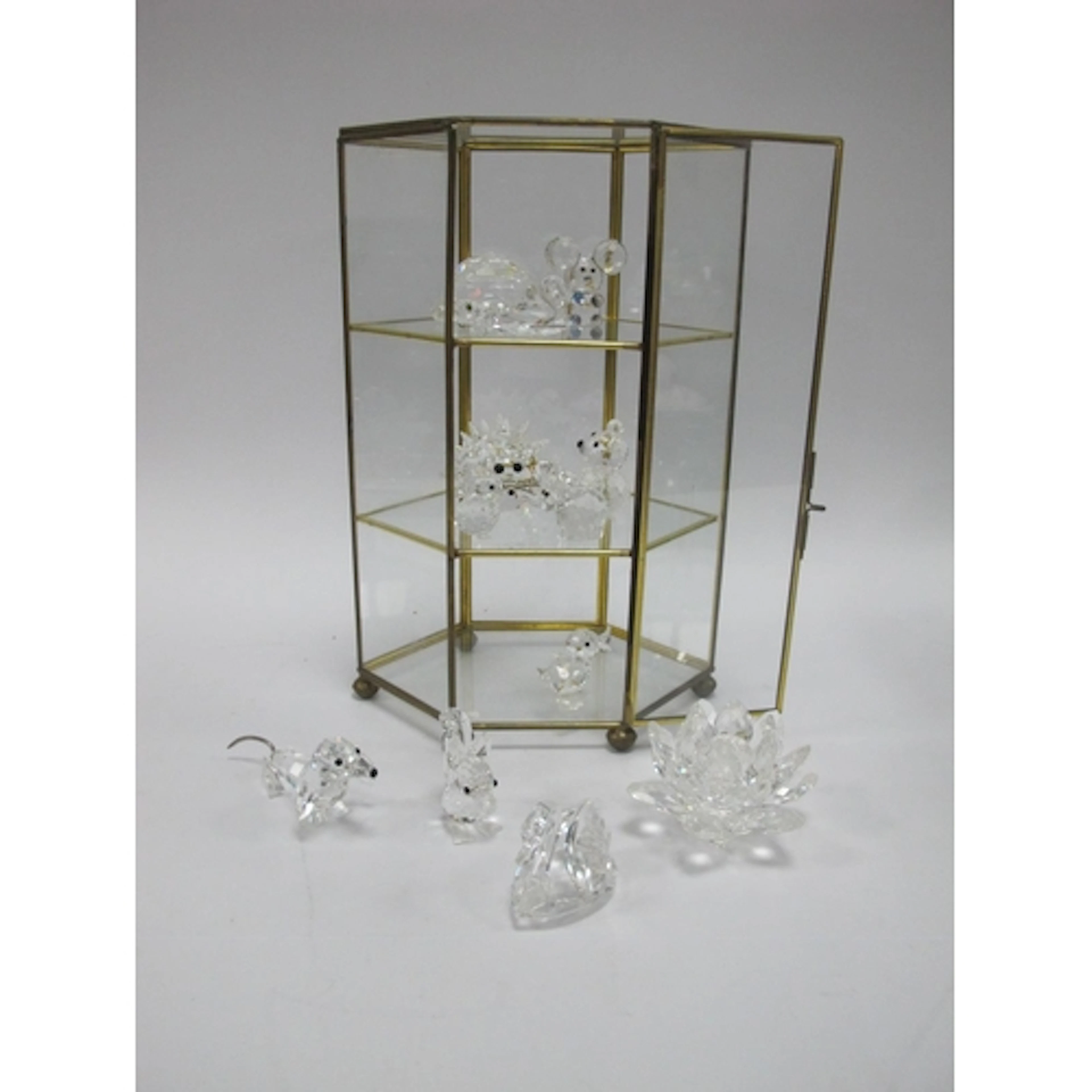 Nine Swarovski crystal animal figures and three other exampl...