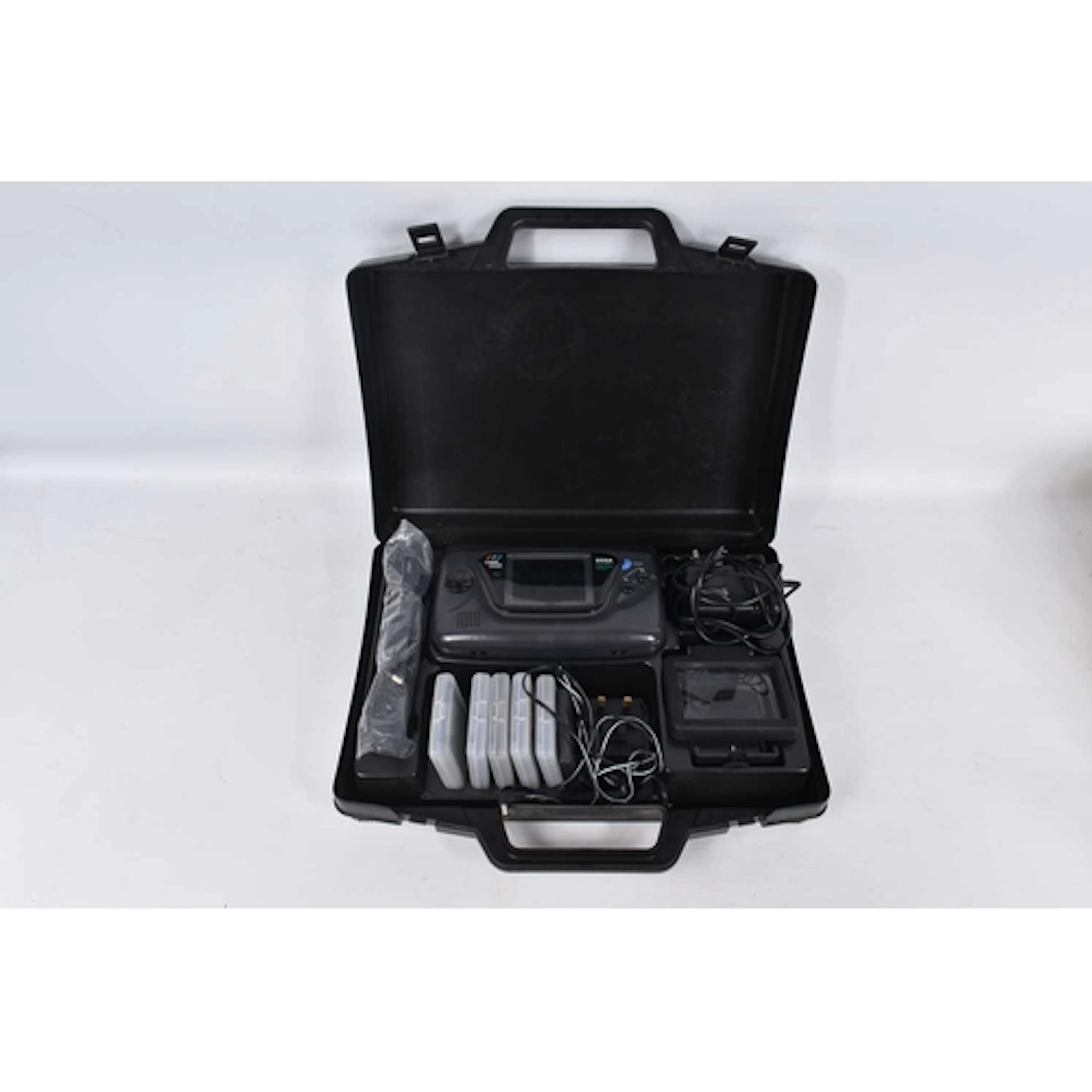 A SEGA GAME GEAR HANDHELD CONSOLE WITH CASE, in black with t...