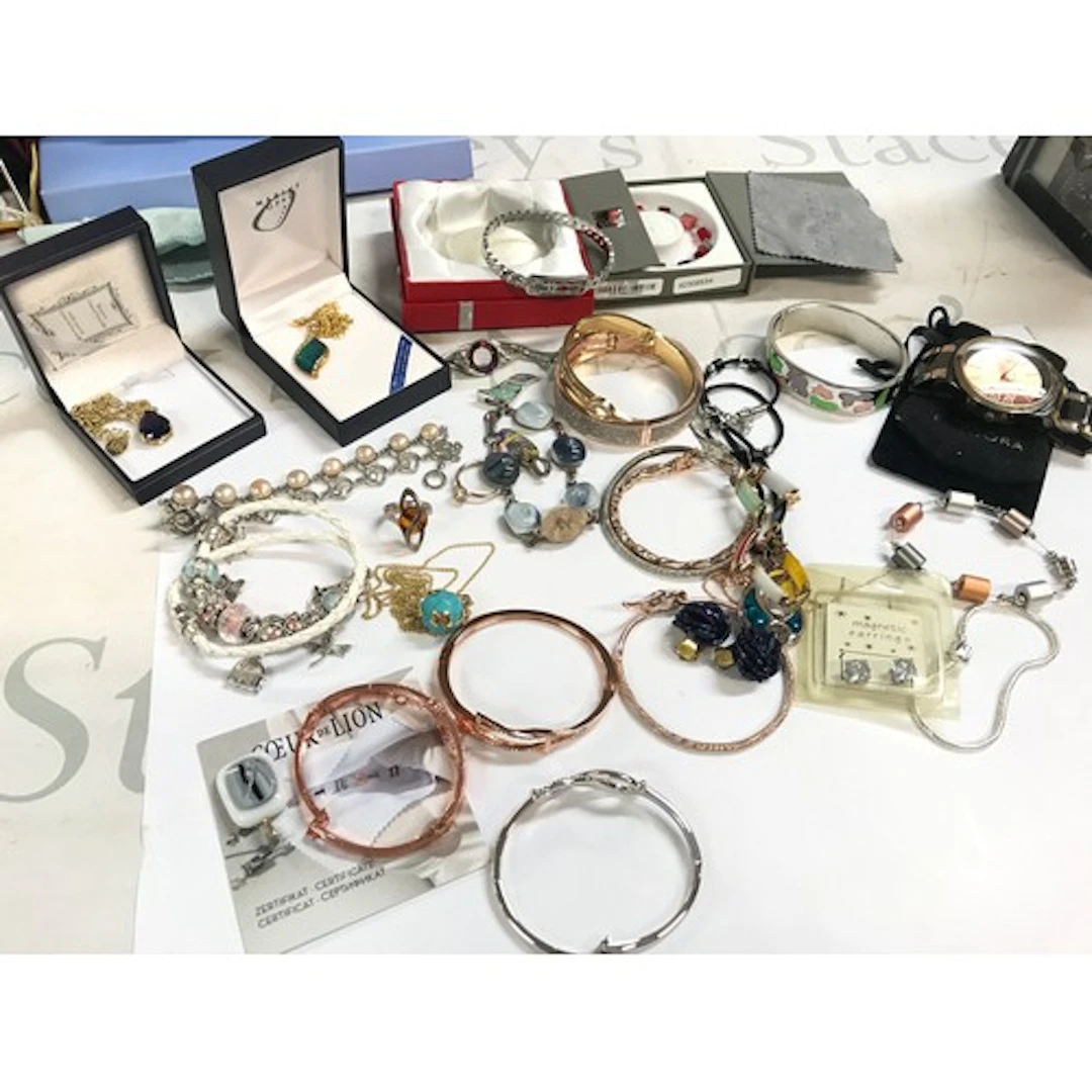 A collection of costume jewellery including bangles, Pandora...