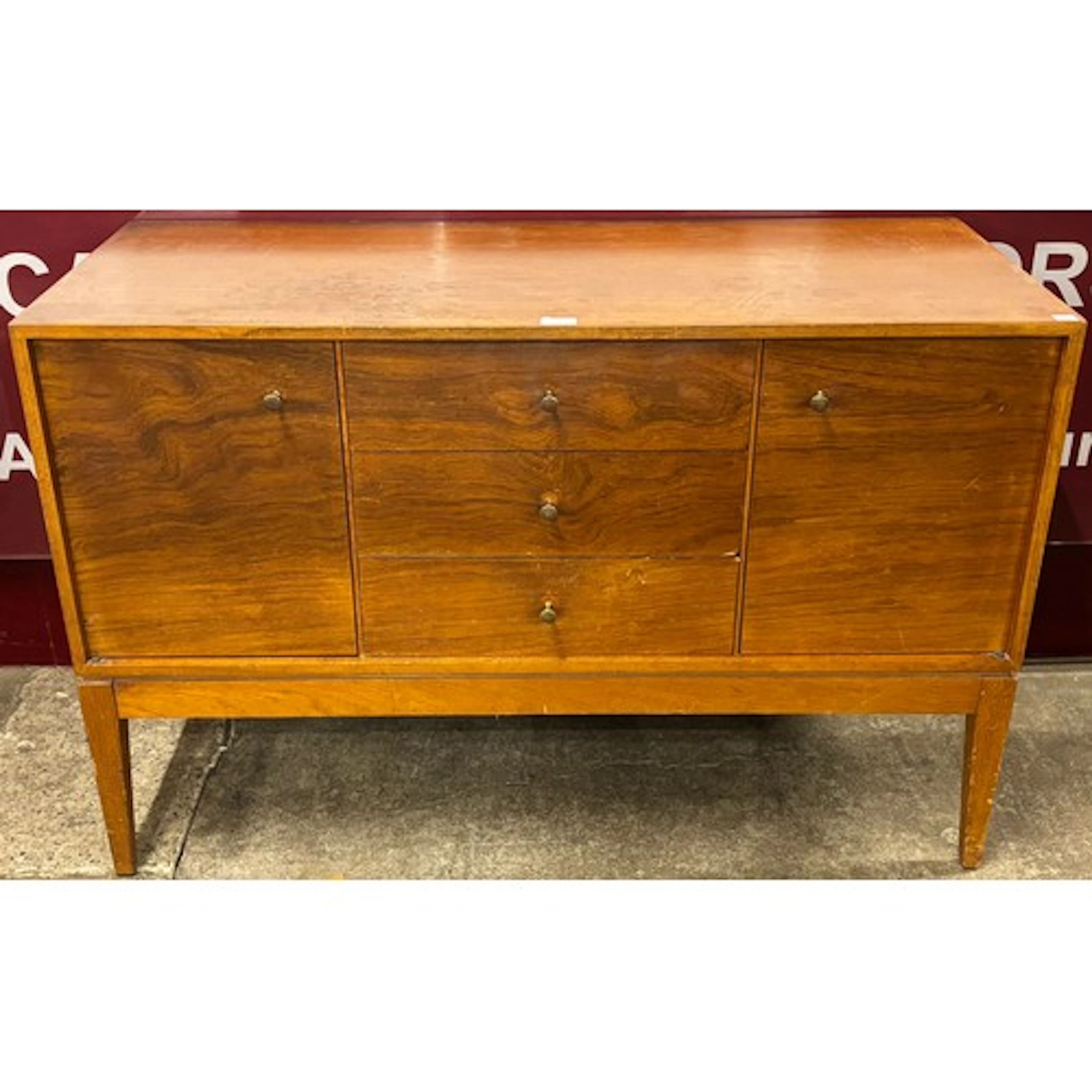 A Uniflex teak and walnut sideboard