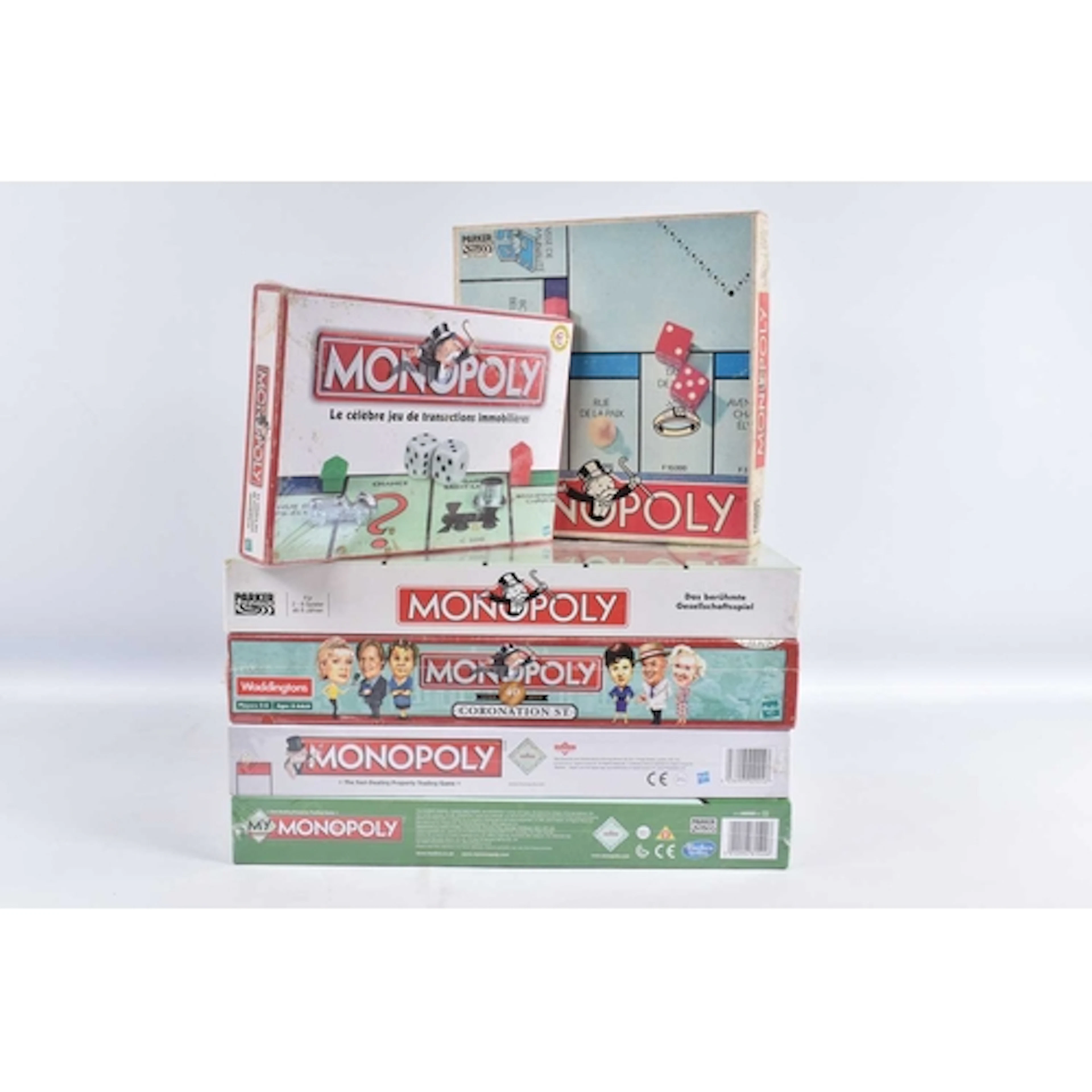 SIX MONOPOLY BOARD GAMES, to include five factory sealed gam...