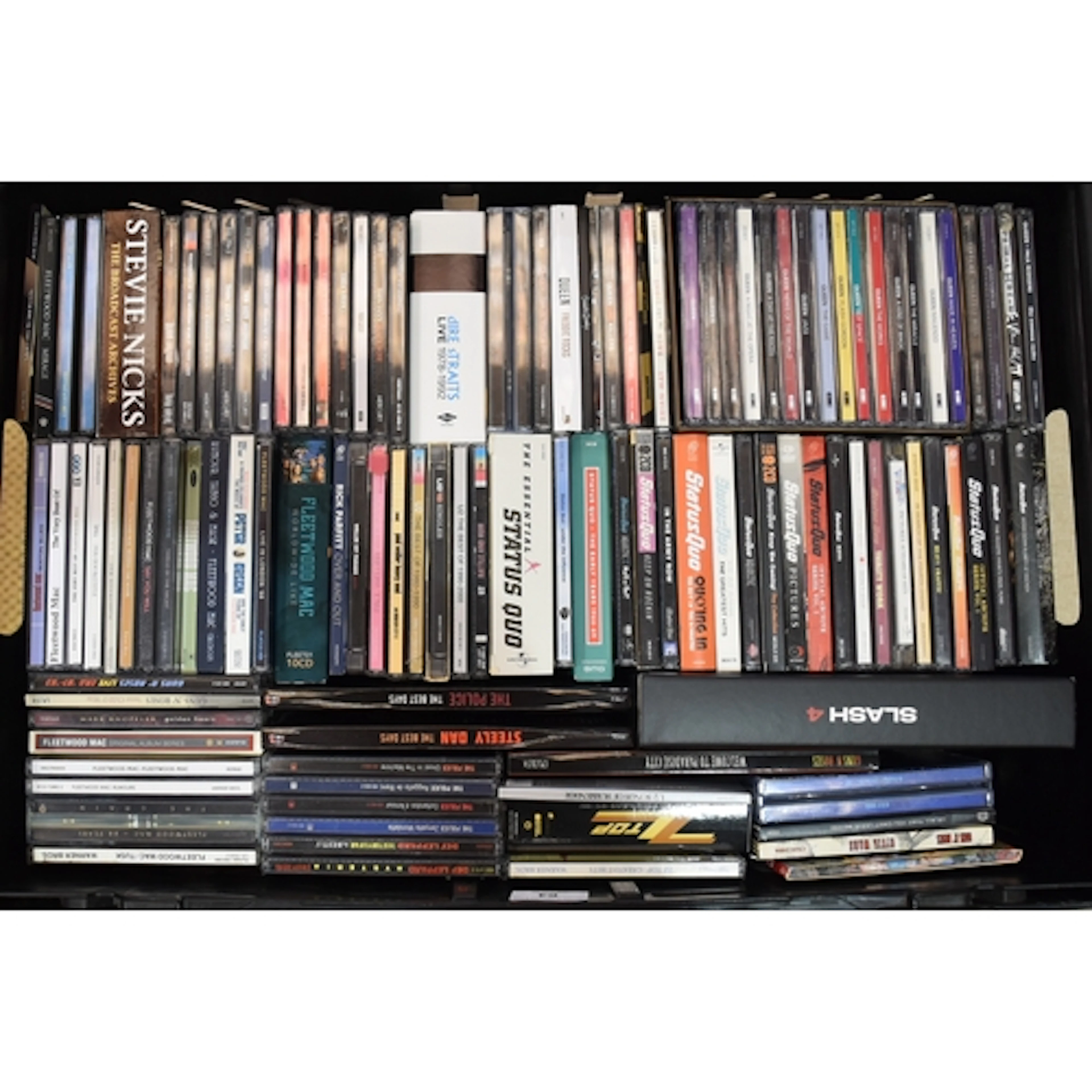 A collection of approximately eighty rock CD's, artists incl...