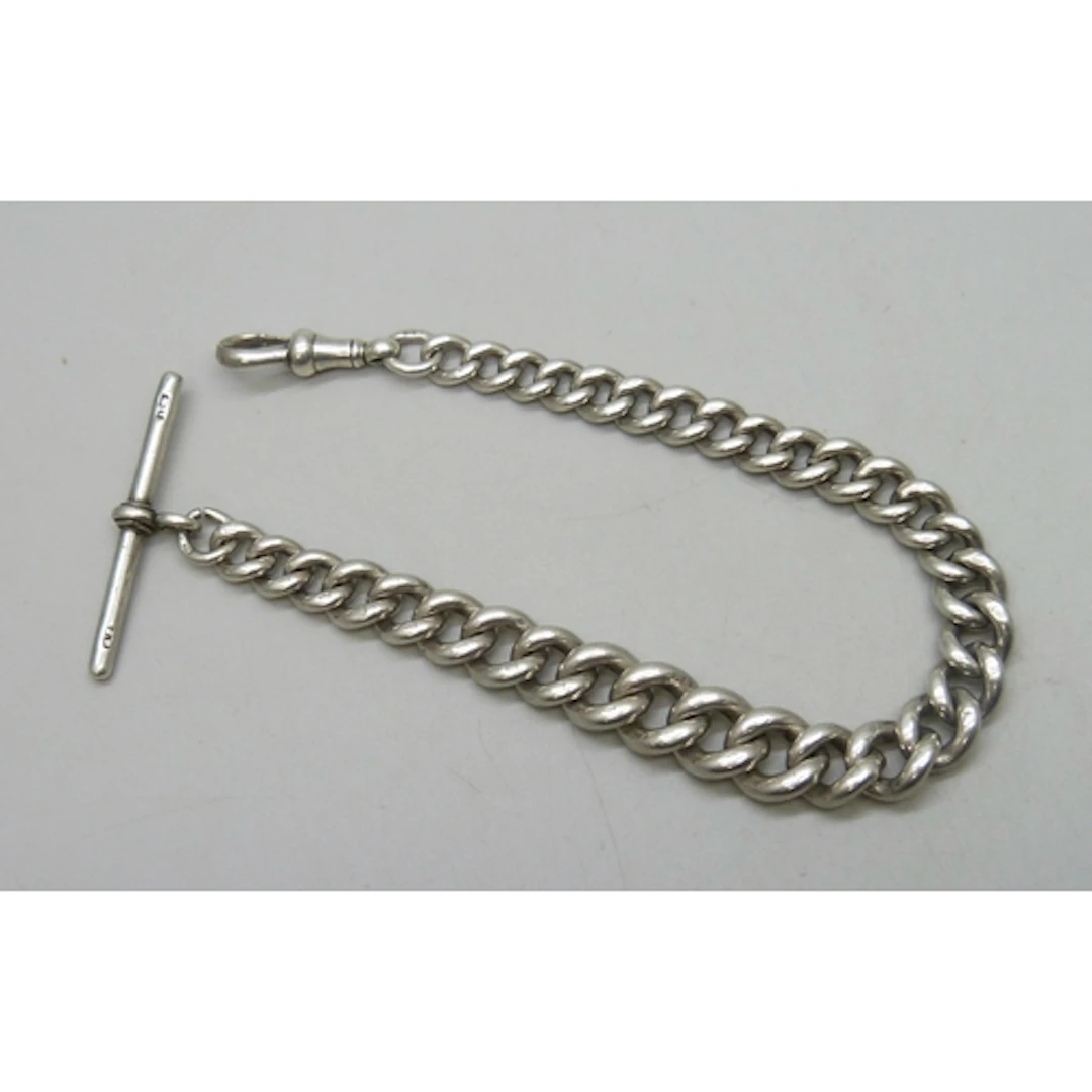 A silver graduated Albert chain bracelet, (each link, T bar ...