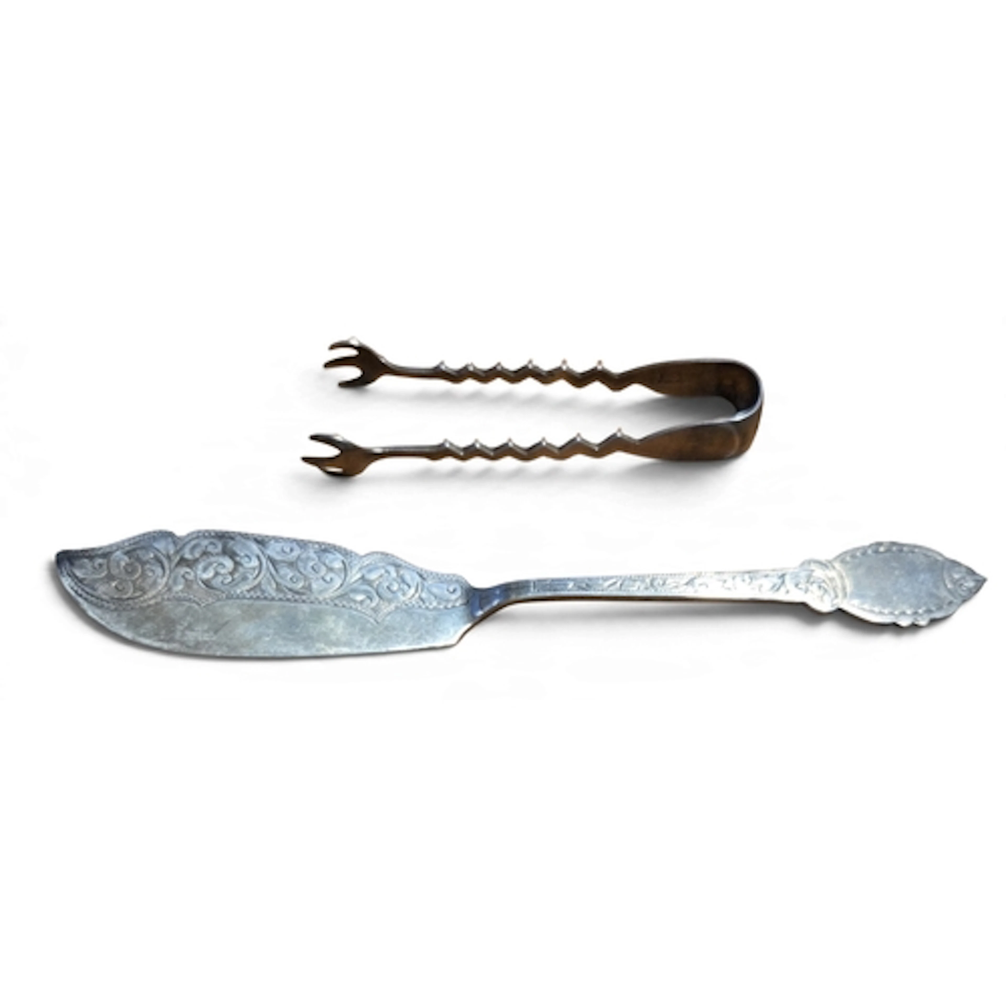 A Gorham Silver Sugar Tongs along with a Sheffield Silver bu...