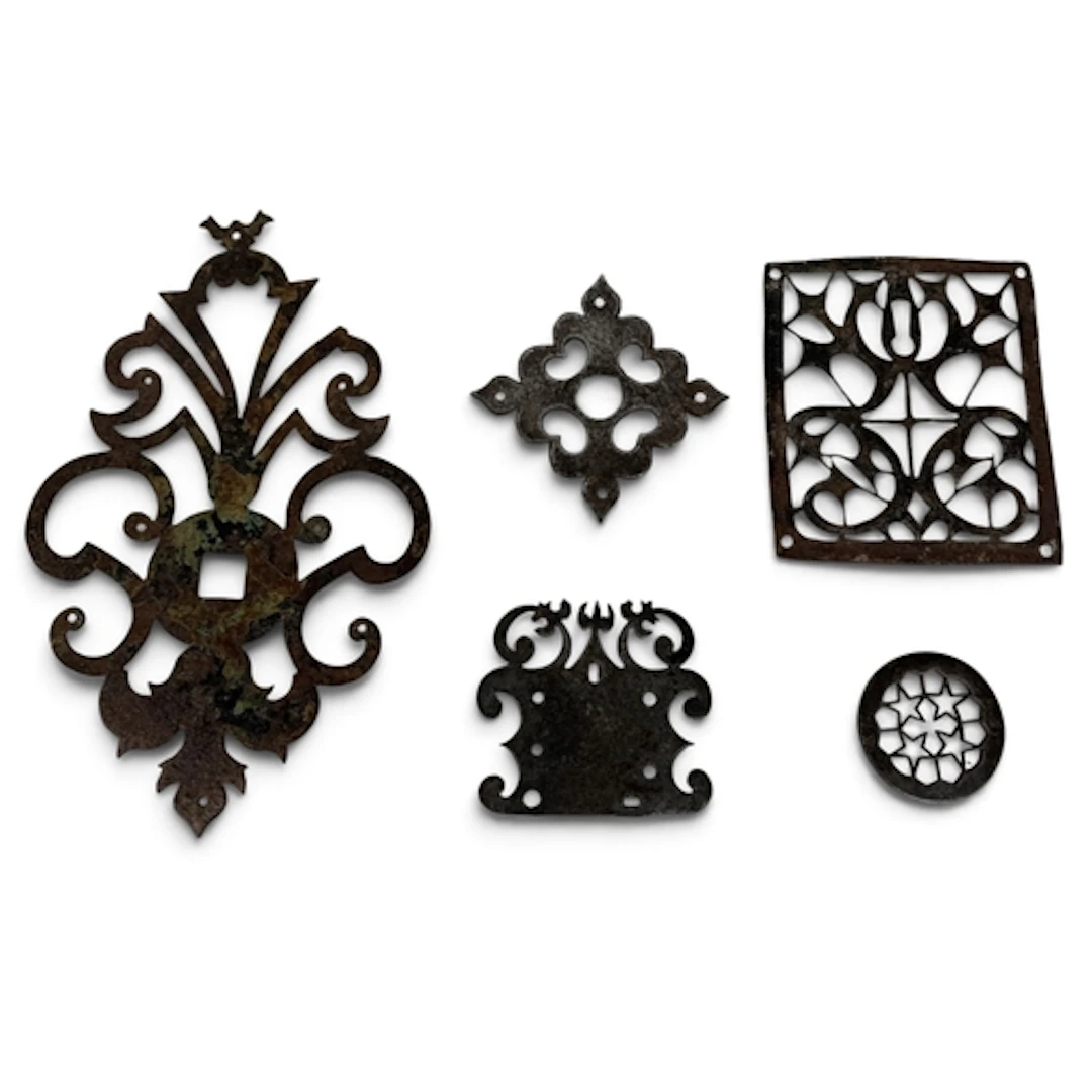 FIVE 18TH CENTURY METAL MOUNTS Largest 25cm W