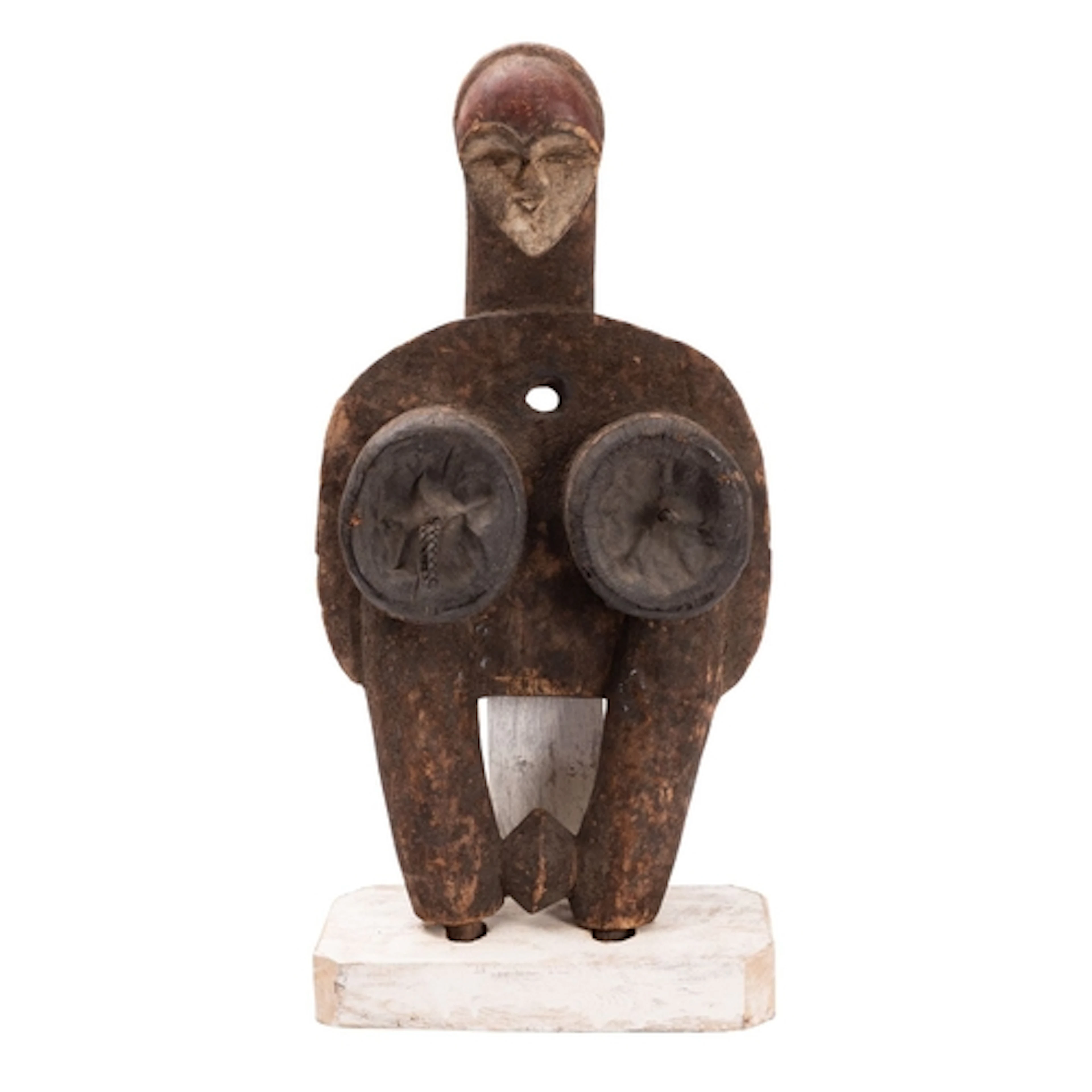 A Punu bellow, of traditional form , with carved face and e...