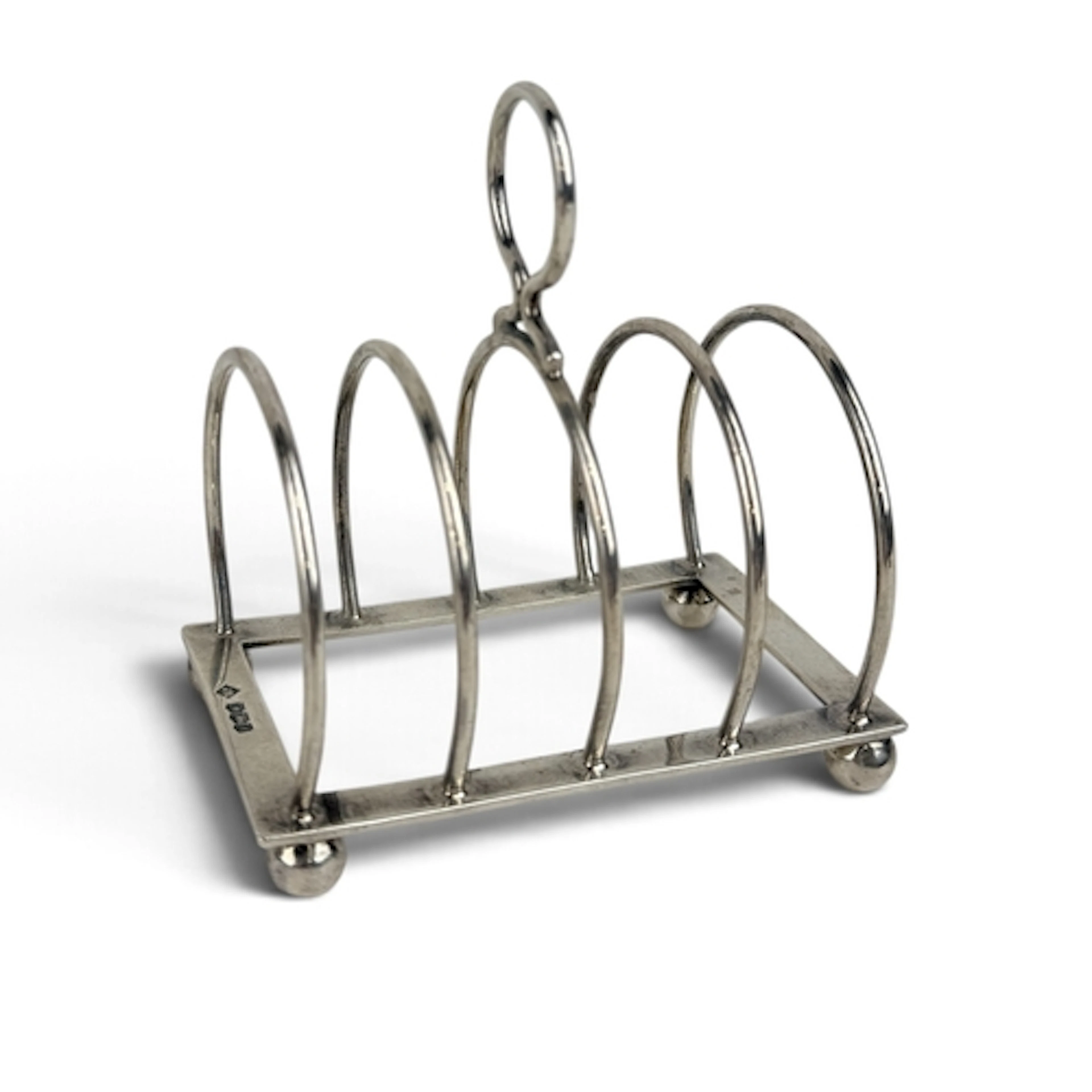 A SILVER FIVE-BAR WIRWORK TOAST RACK, SHEFFIELD 1923 Retaile...