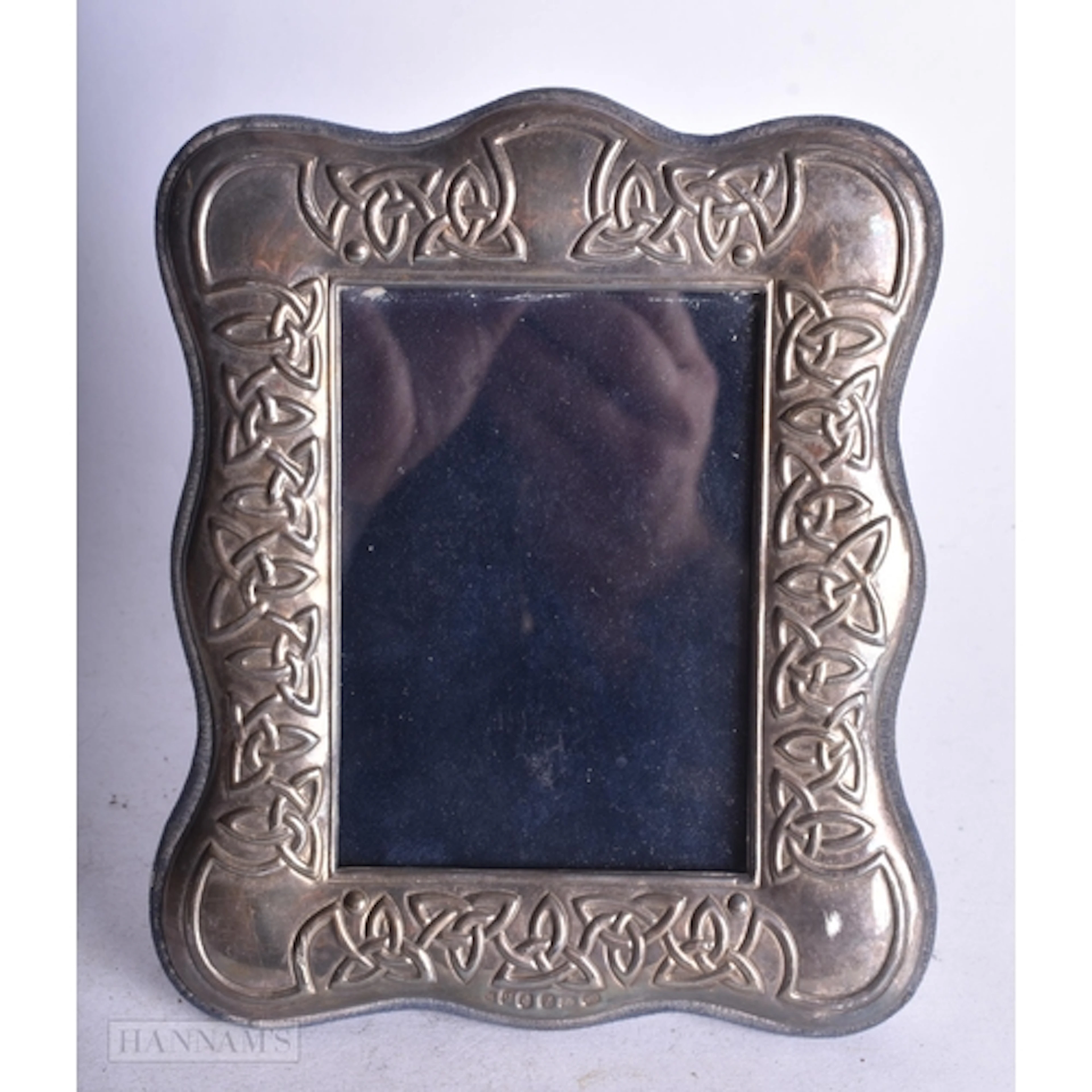 A Irish Silver Mounted Photo Frame with Celtic Designs. Hal...