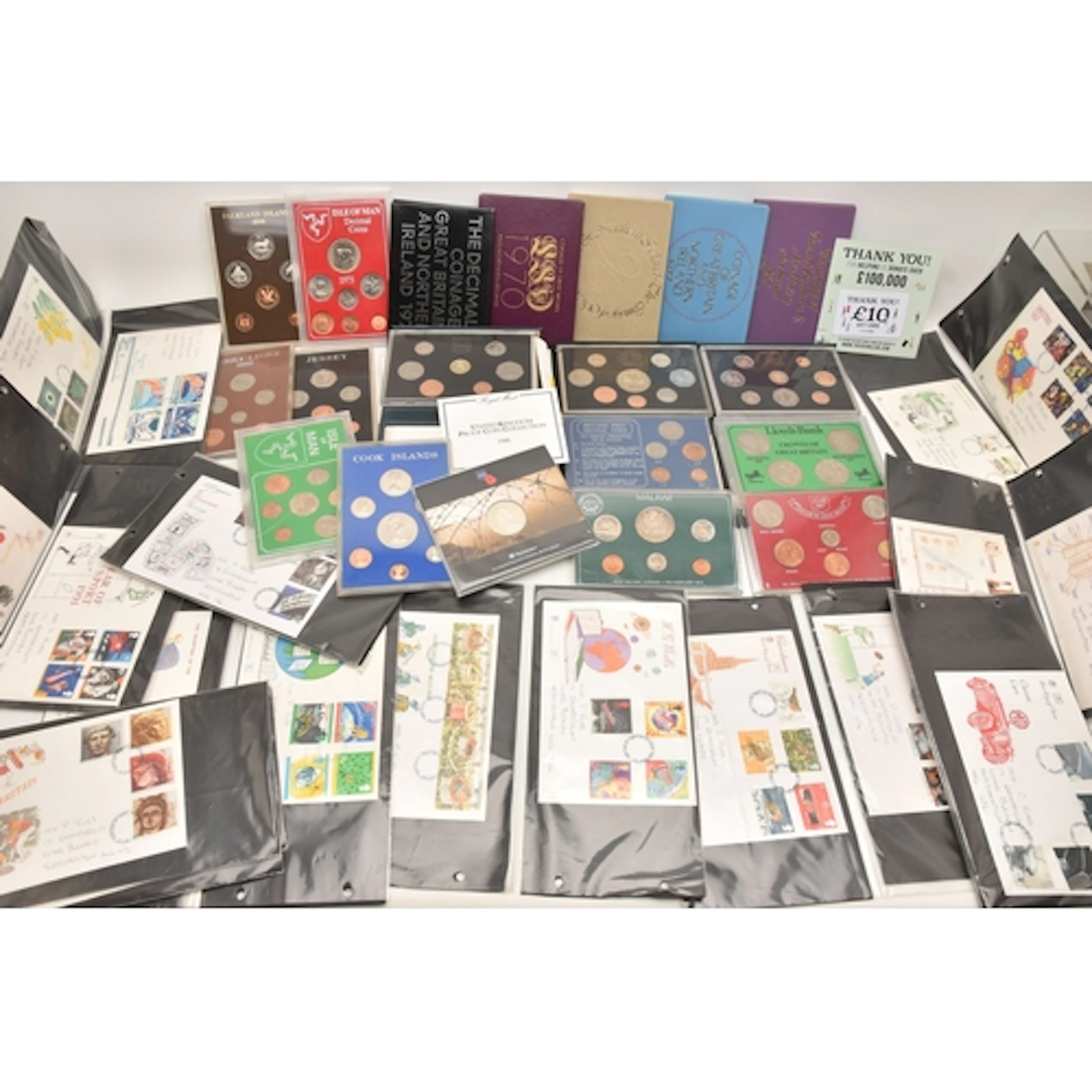 A plastic box containing 7 UK Proof Sets 970, 1971,1976,197...