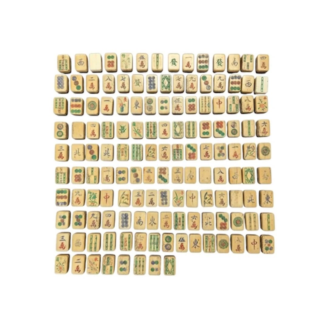 A set of early 20th century Chinese bone and wood mahjong ti...