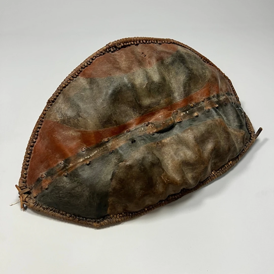 MAASAI HIDE SHIELD KENYA PAINTED IN GEOMETRIC PATTERN. Maasa...