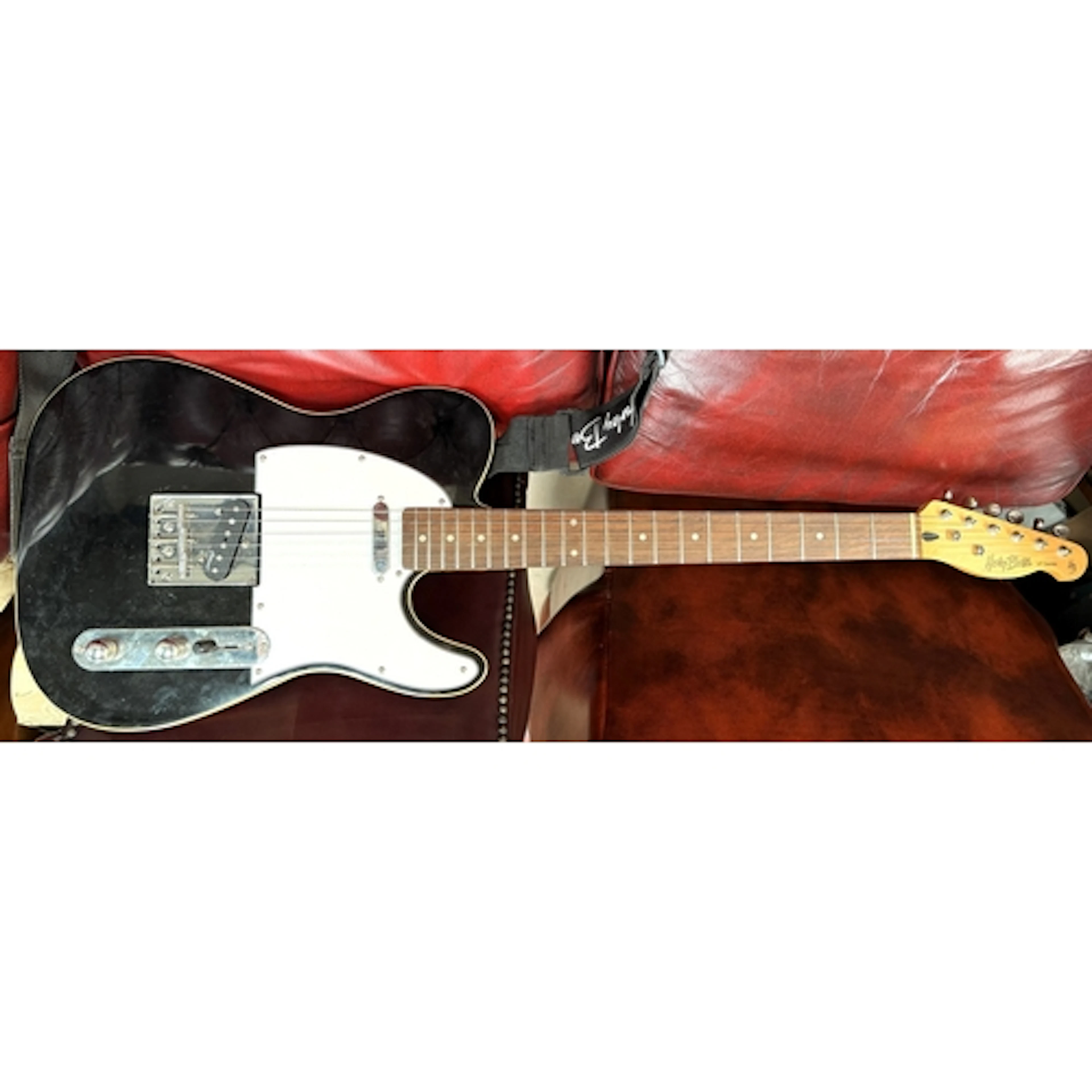 A Harley Benton Vintage Series (VT) electric guitar with bla...