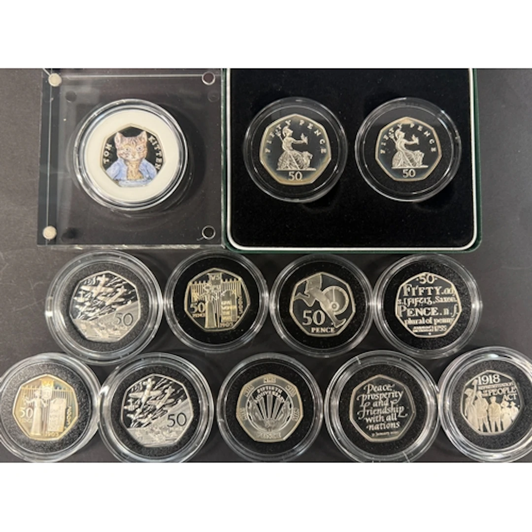A group of 12 UK QEII 50p silver proof coins, comprising 199...