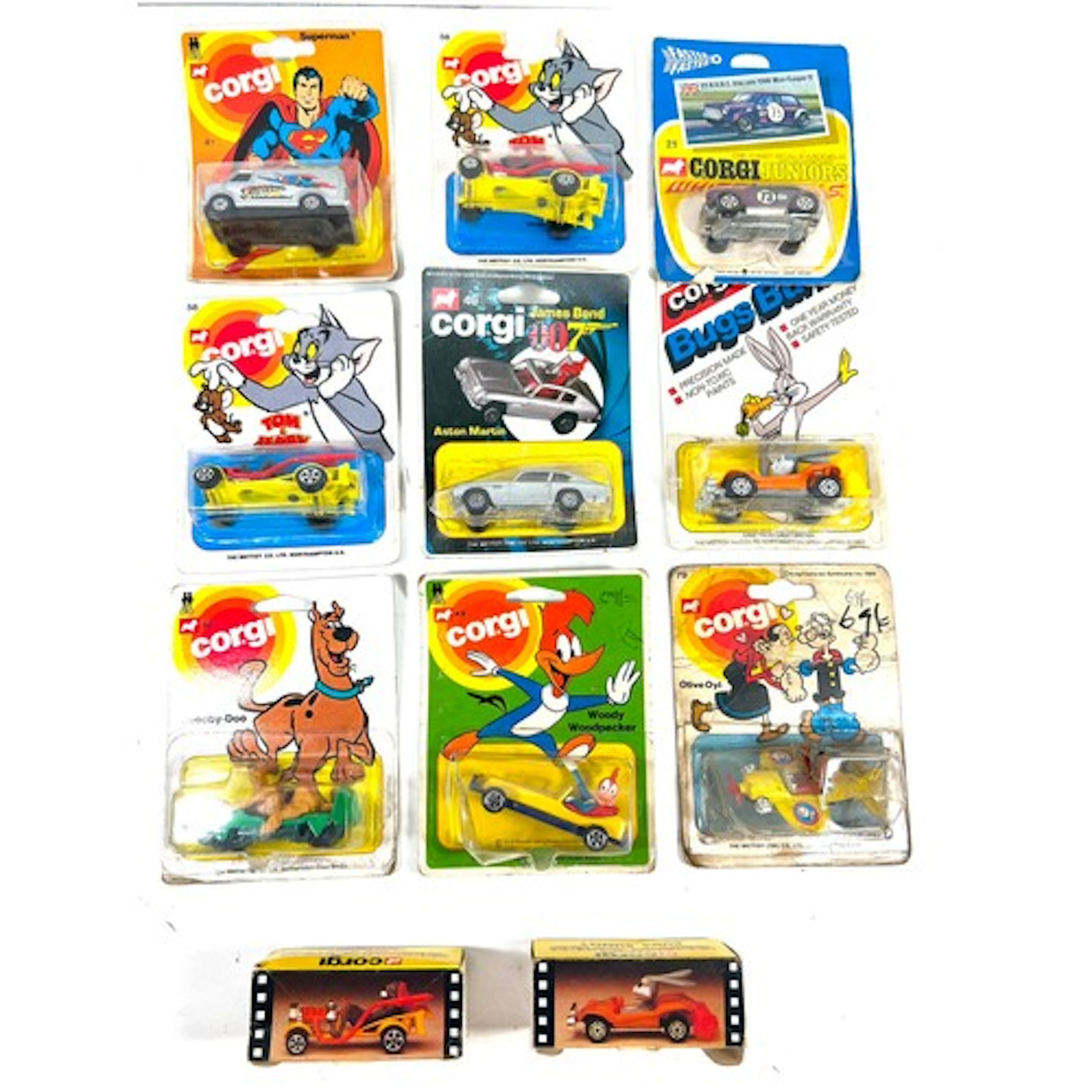 11 Corgi Juniors in carded blister packs and boxes. Superman...