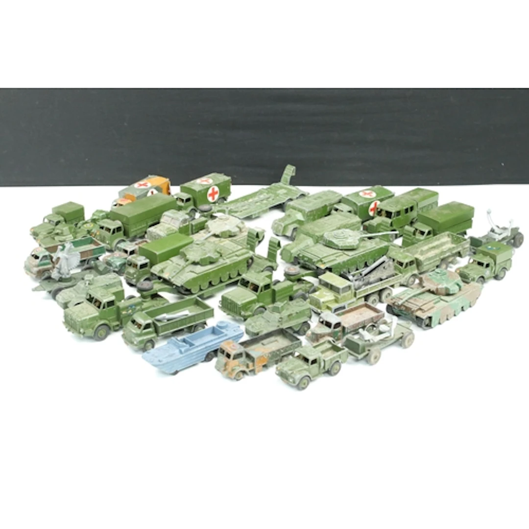 35 Mid 20th C playworn military diecast models to include ma...