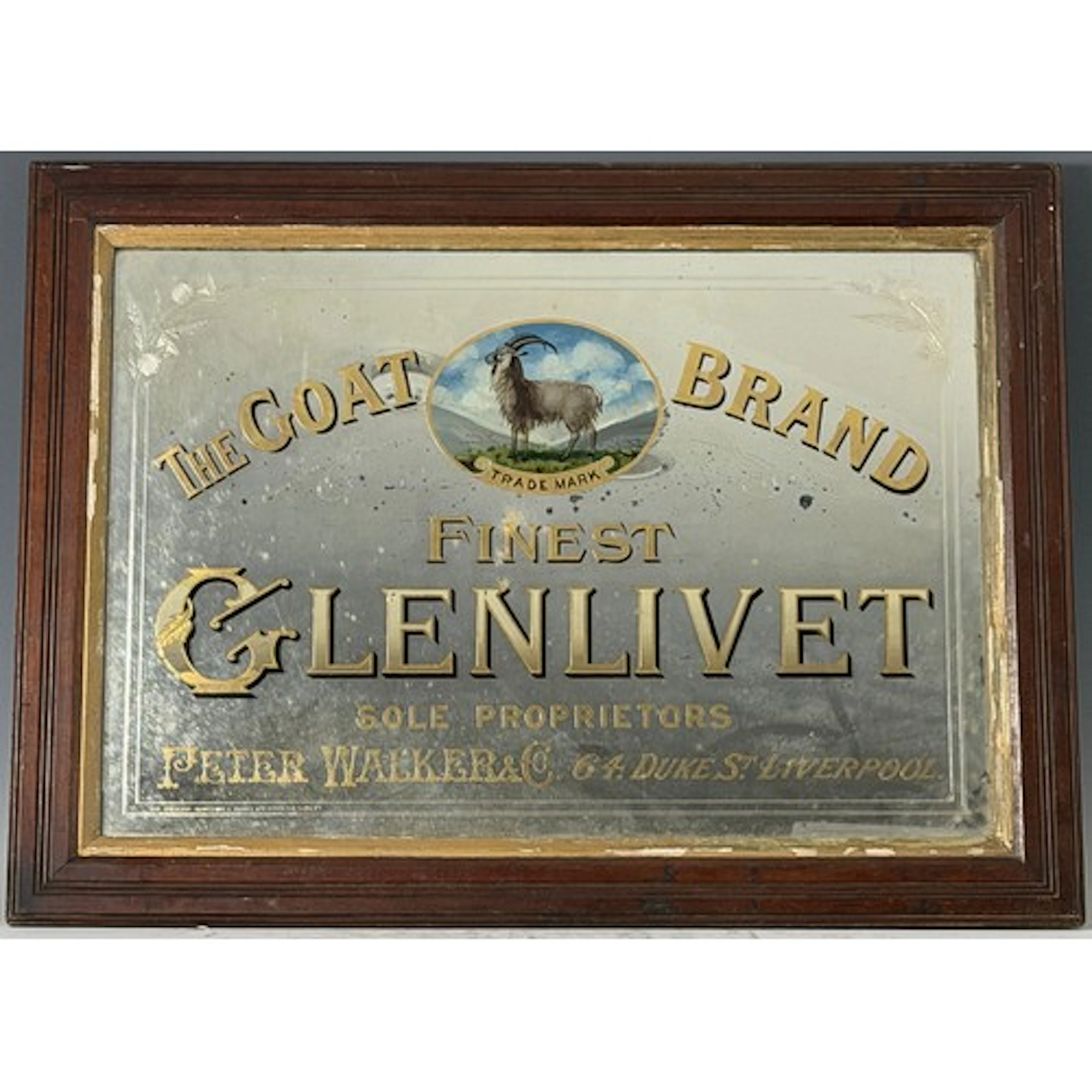 An early 20th century Advertising Mirror for 'The Goat Brand...