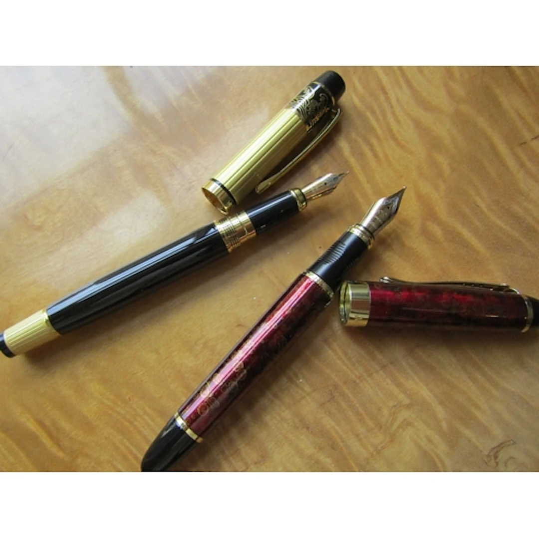 Two Fountain Pens One with Fourteen Carat Gold Nib