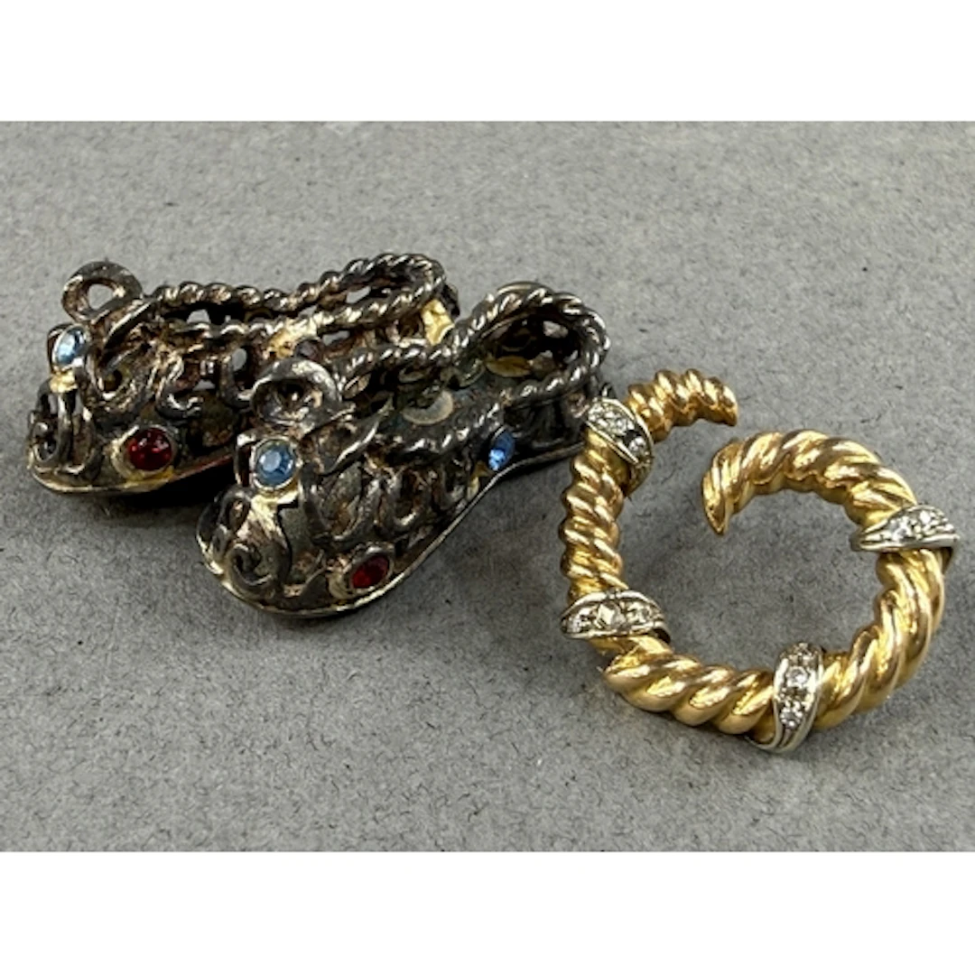Jewellery: a yellow metal and diamond set single earring, un...