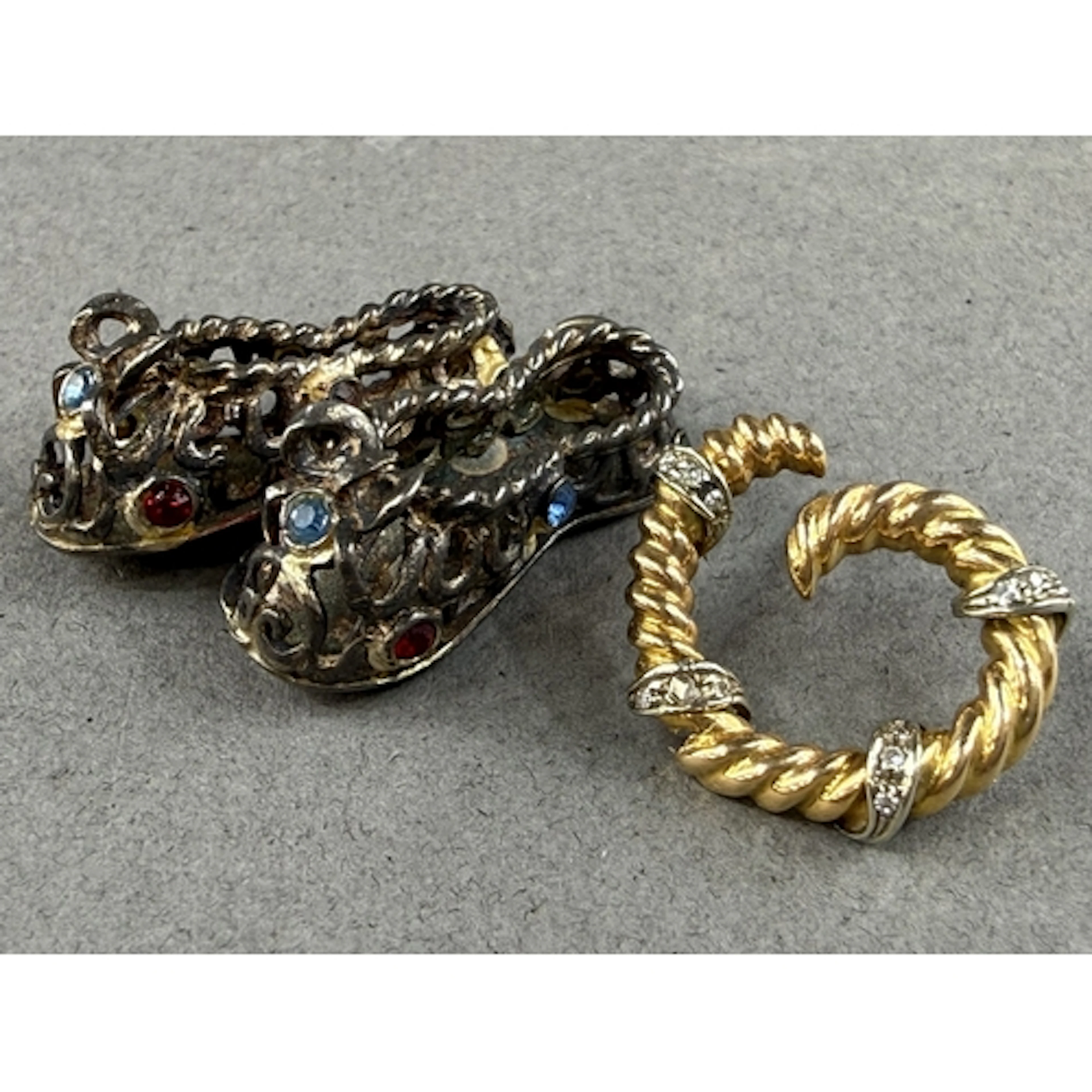 Jewellery: a yellow metal and diamond set single earring, un...