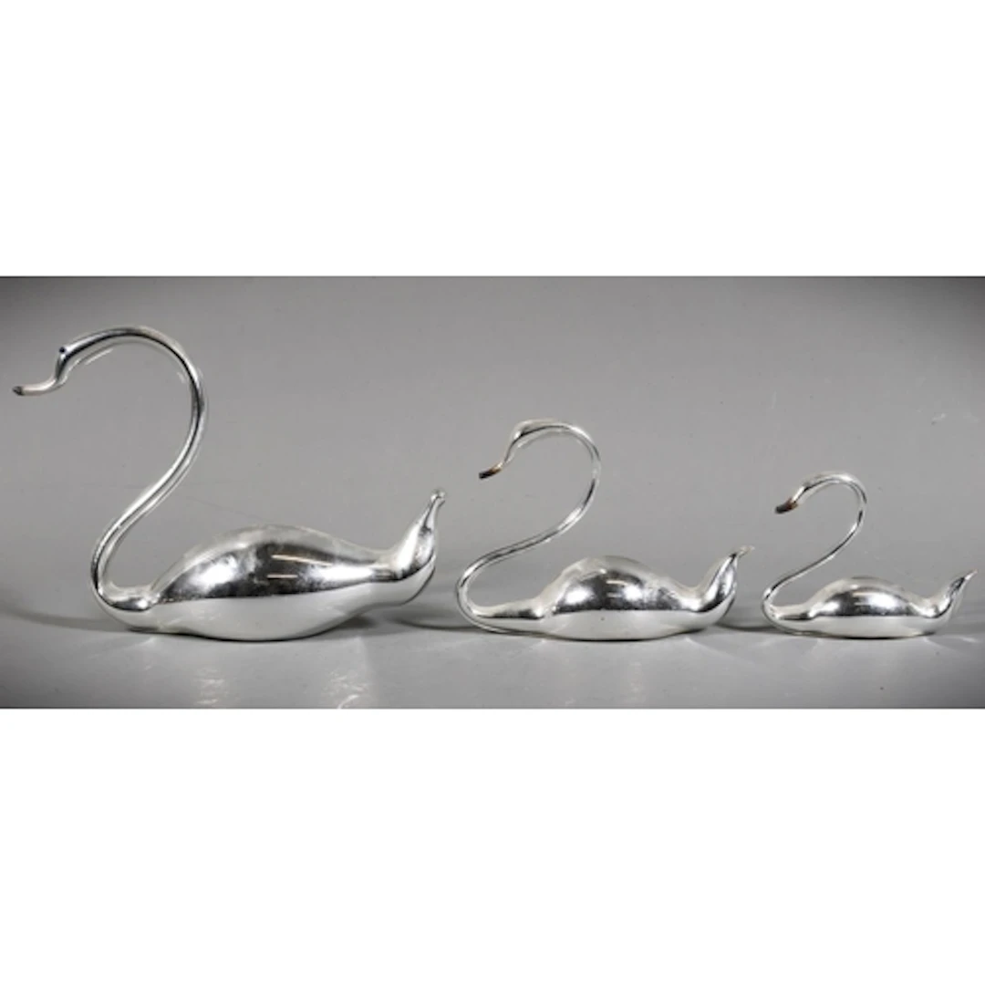 Art deco style of model of three swans