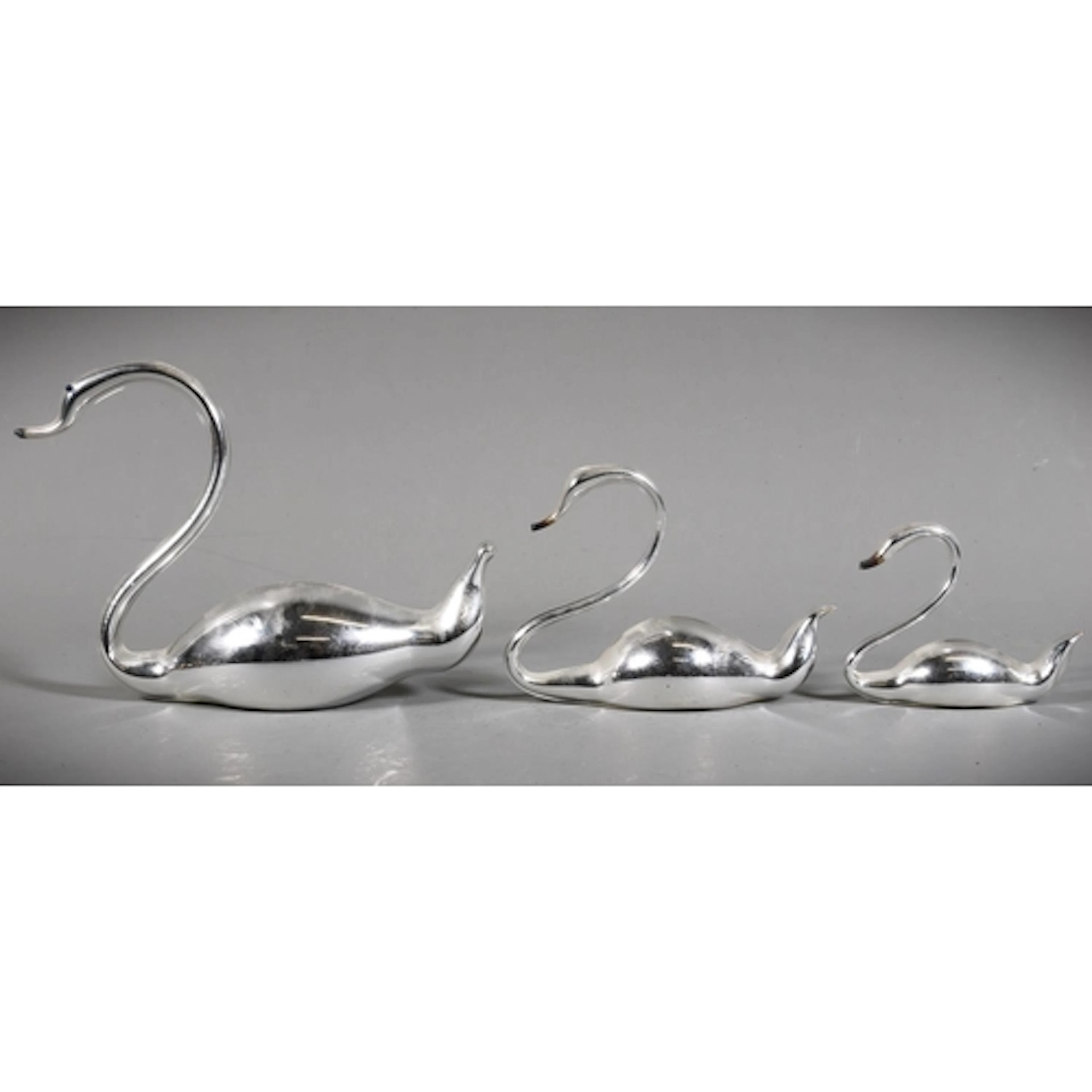 Art deco style of model of three swans