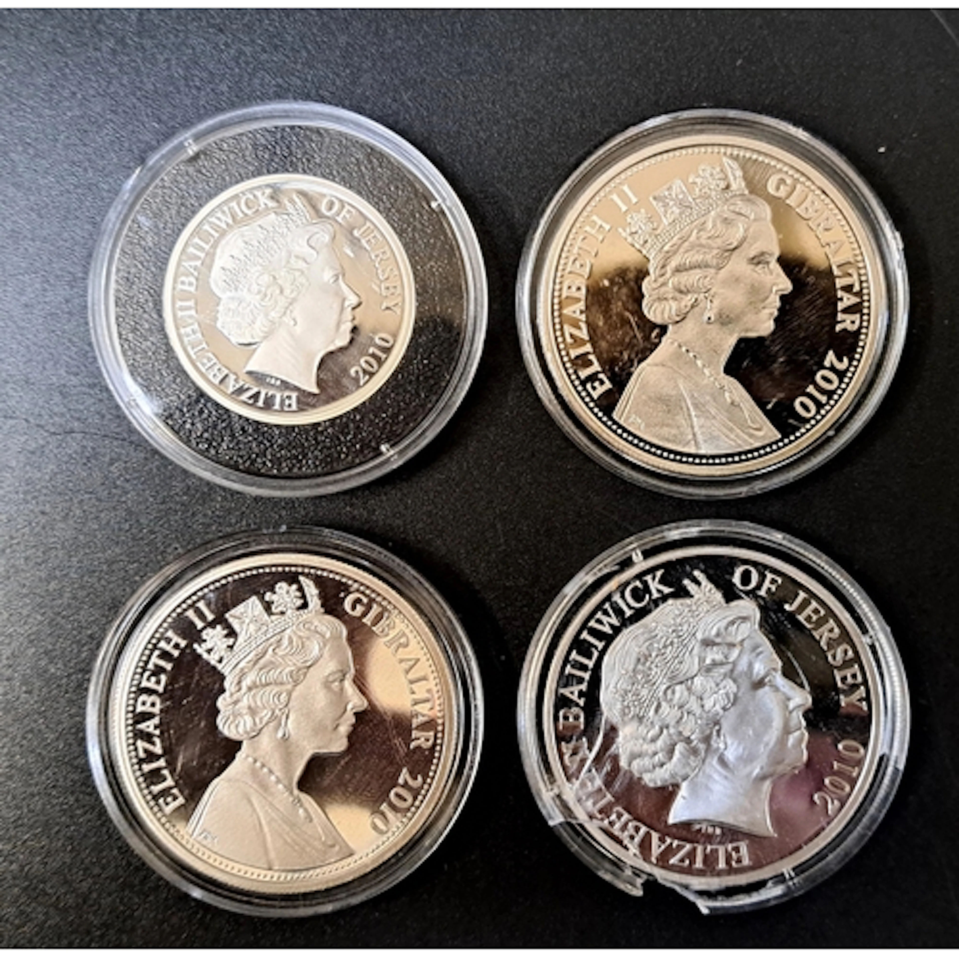 FOUR SILVER PROOF COINS RELATING TO WAR comprising two 2010 ...