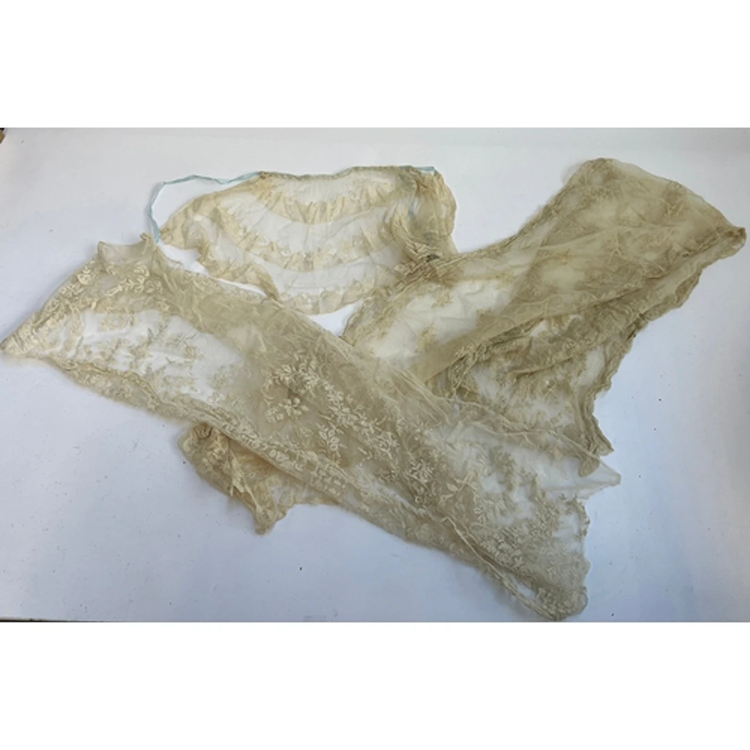A collection of antique lace and tulle
