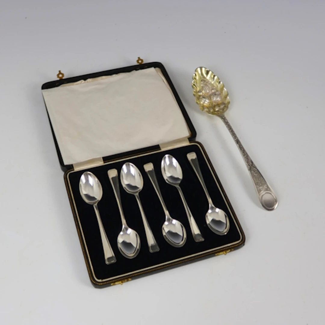 A George III silver 'berry' spoon, possibly 'JG' London 1784...