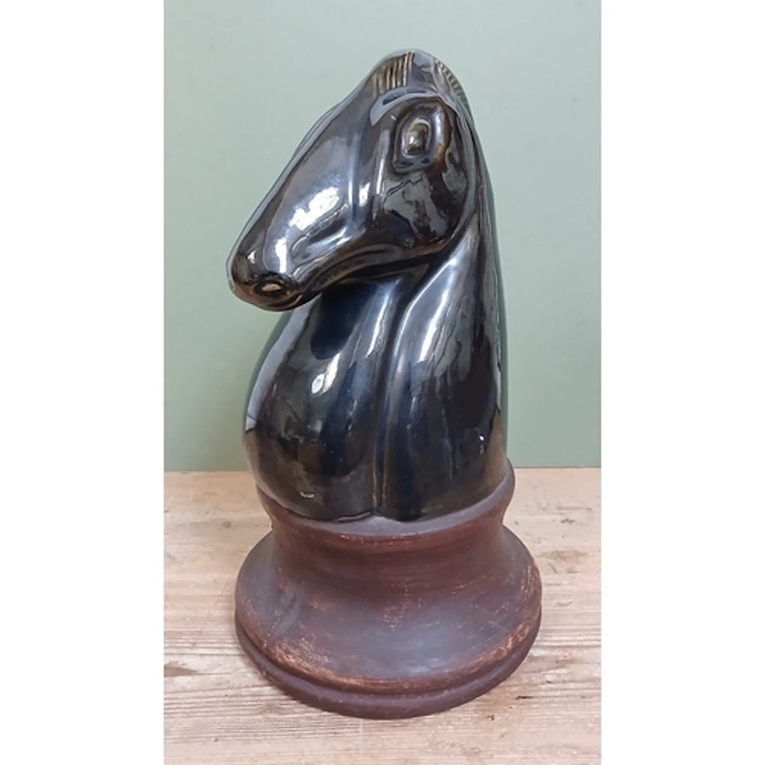 A glazed pottery knight, height 39cm.