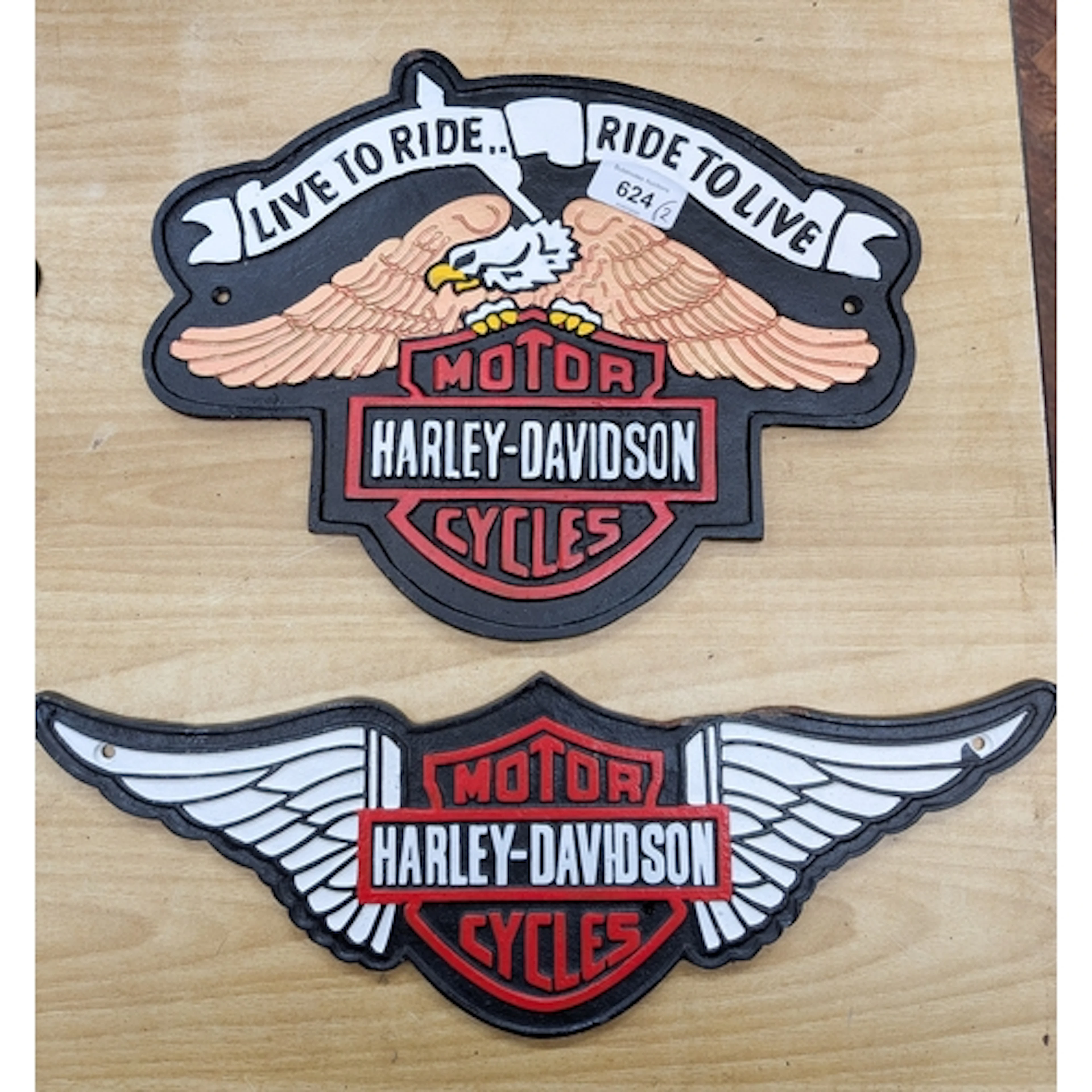 A shaped painted cast iron Harley Davidson Motorcycles sign ...