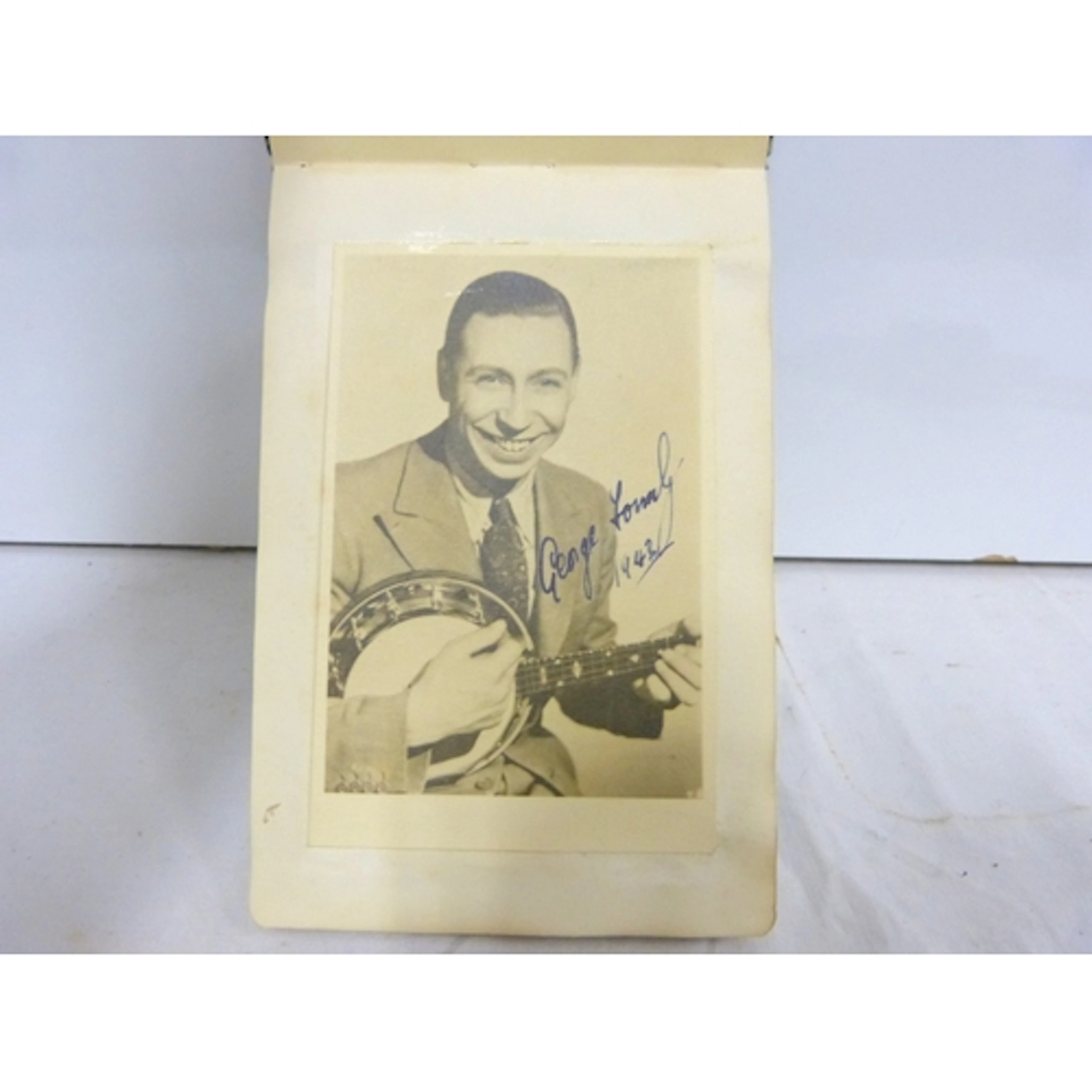 Autograph album containing Peter Sellers, Denis Compton, Art...
