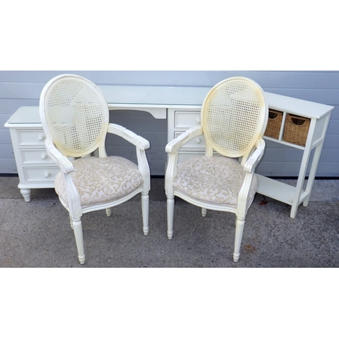 A painted dressing table, bedside chest, basket side table a...