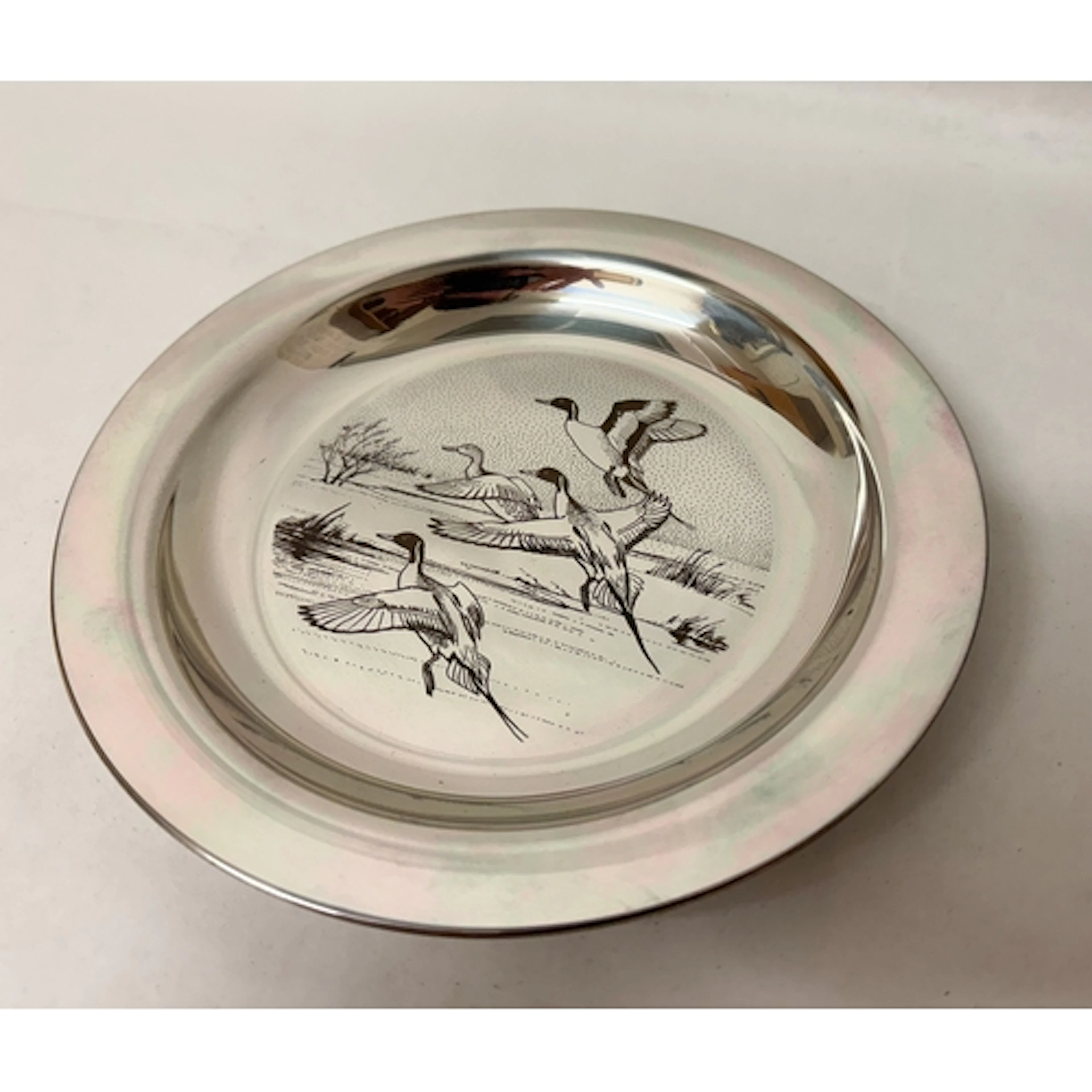A silver 1972 Peter Scott Christmas plate by John Pinches, f...