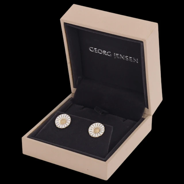 GEORG JENSEN - a pair of Danish modernist sterling silver-gi...