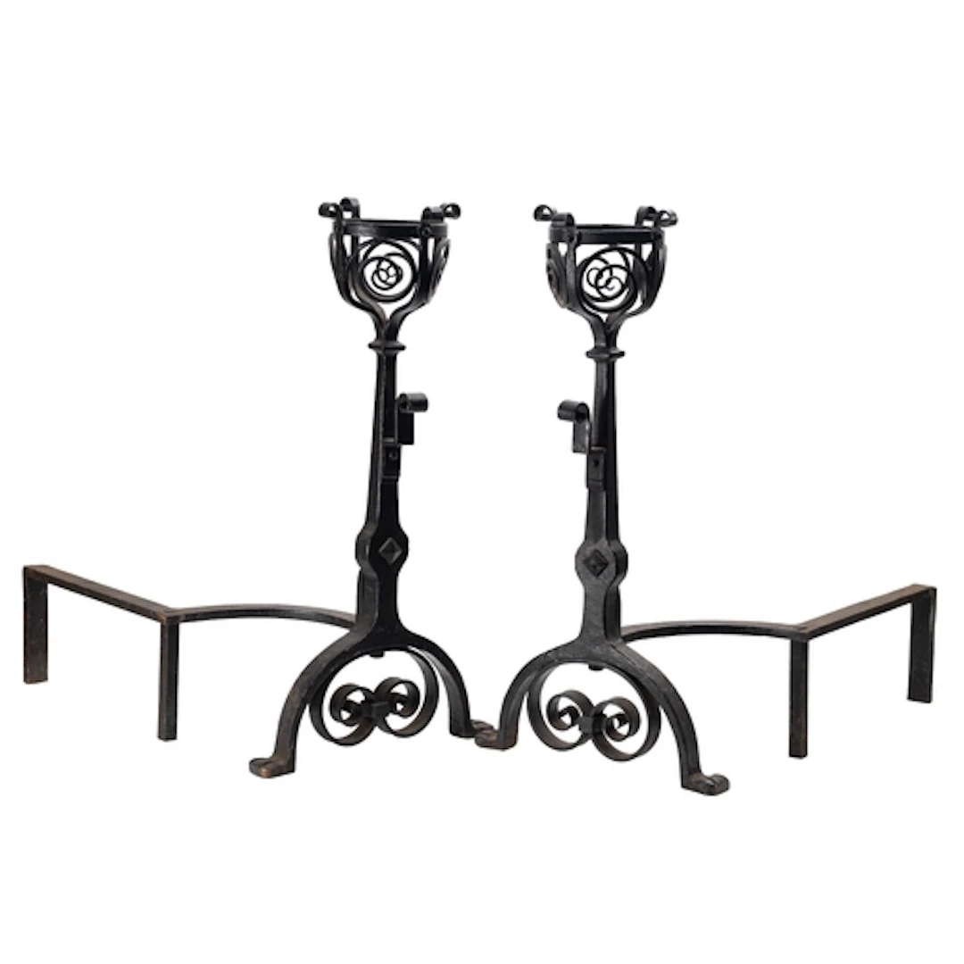 A pair of wrought iron andirons in 17th century style, early...