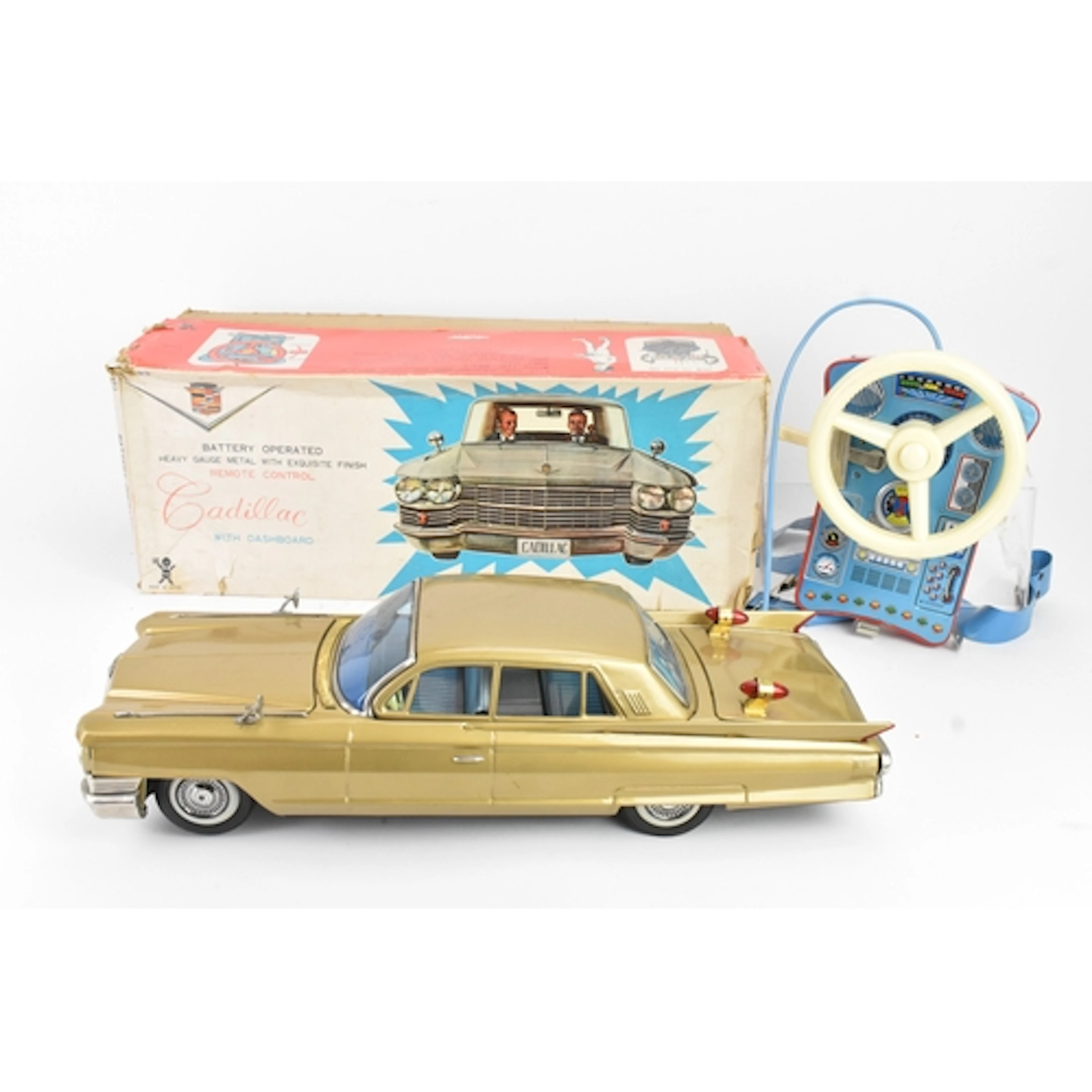 A Bandai battery-operated tinplate remote control Cadillac t...