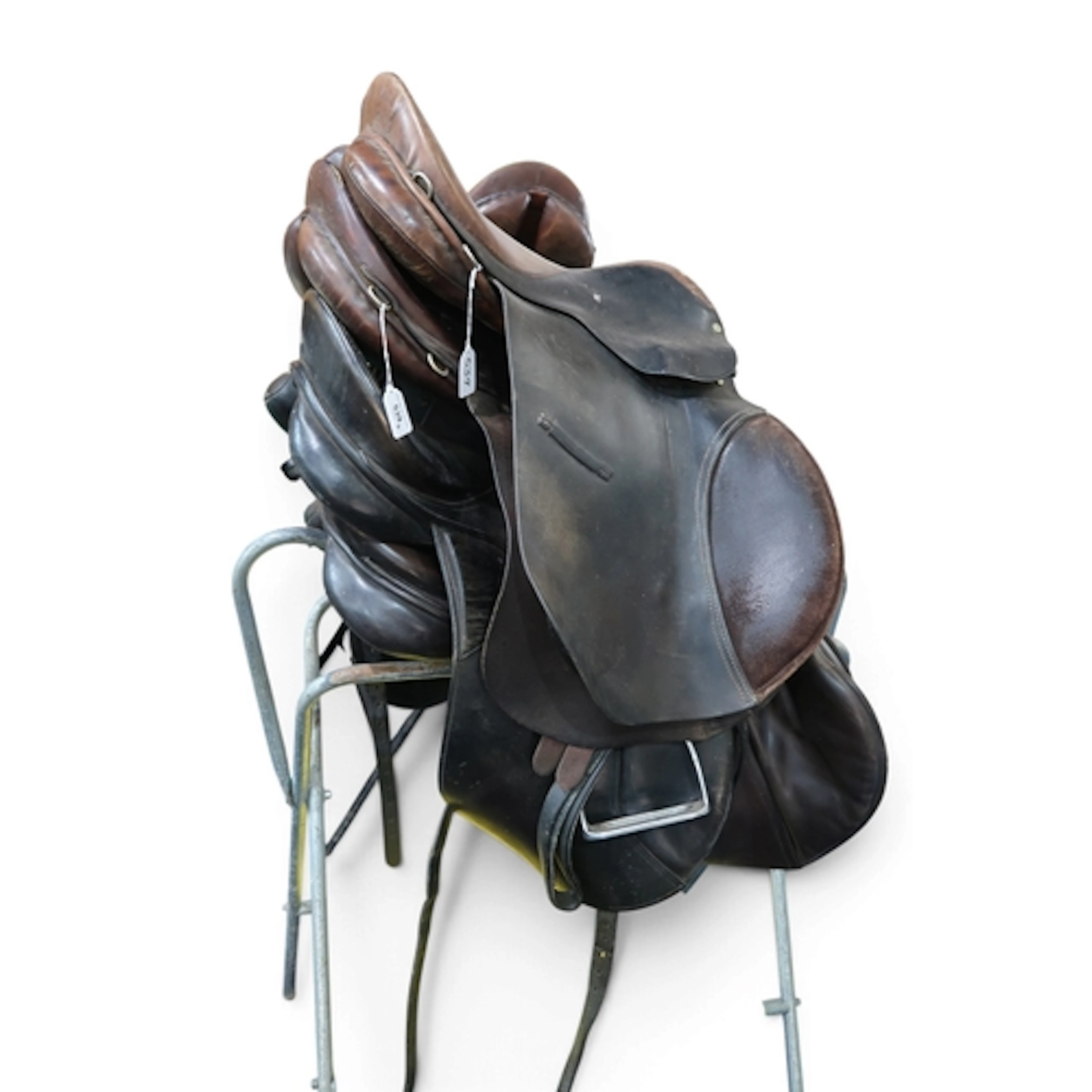 Four various equestrian saddles, including examples by the S...