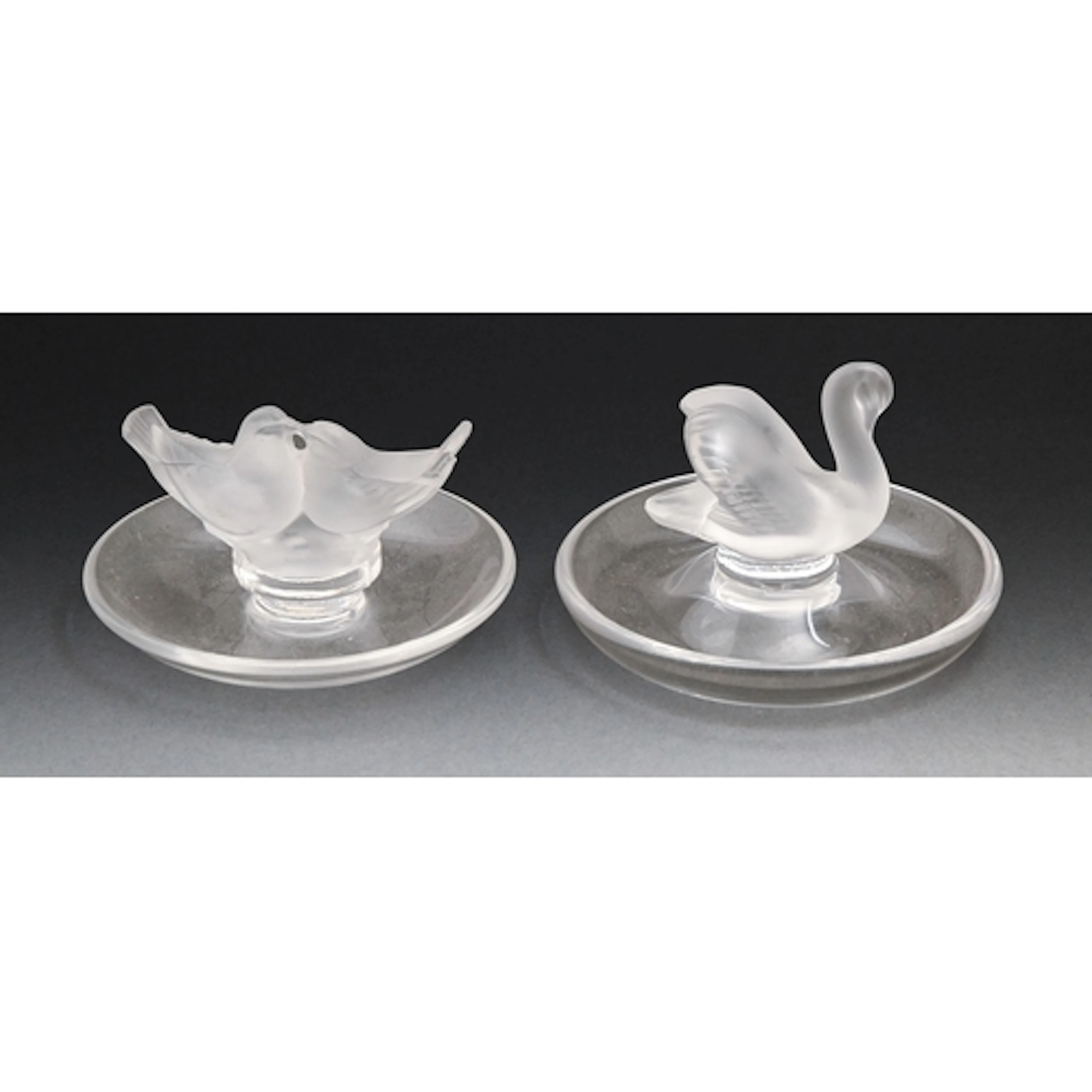 "Deux Colombes" and "Cygne". Two Lalique frosted glass dishe...