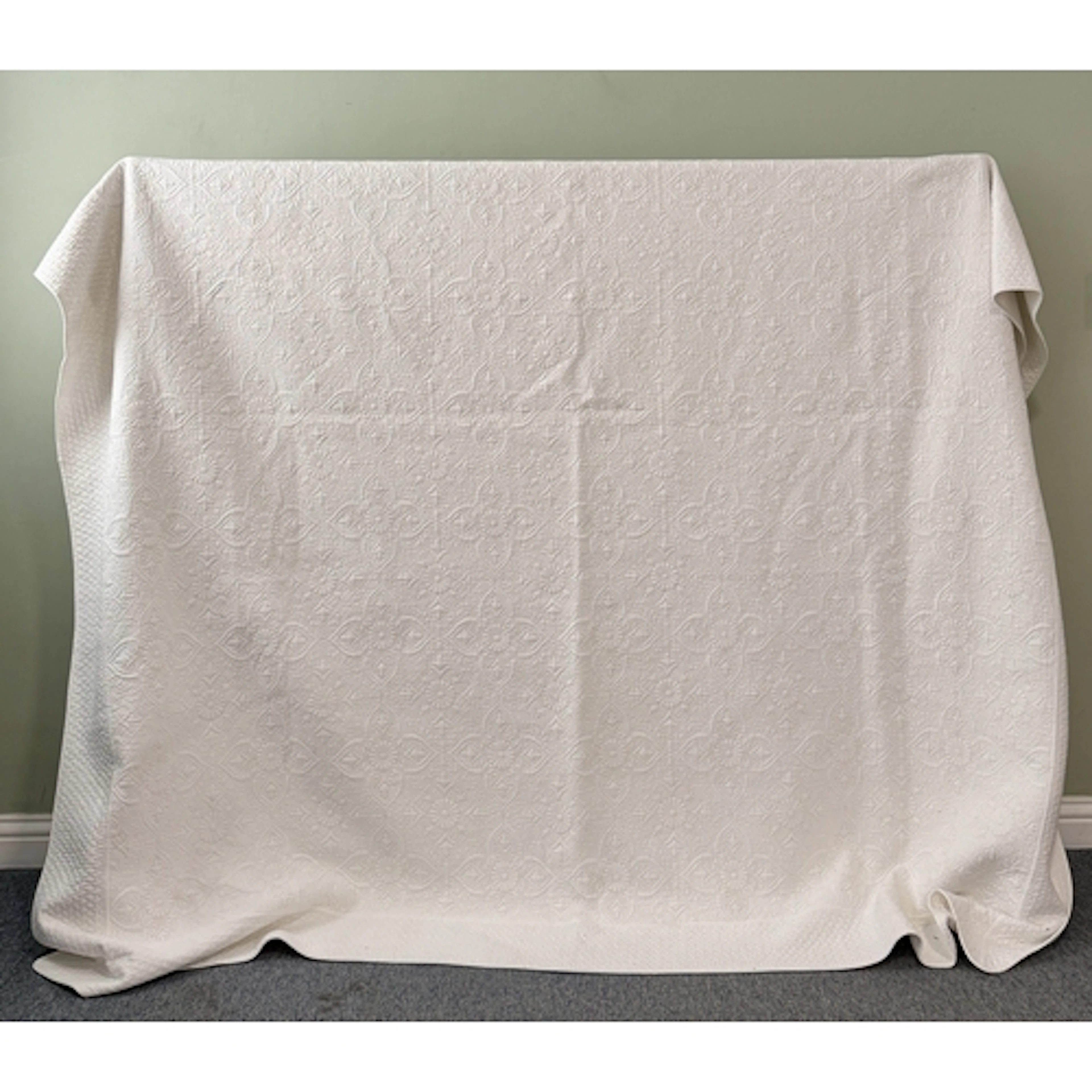 A Forever England quilted bedspread - in cream, quilted with...