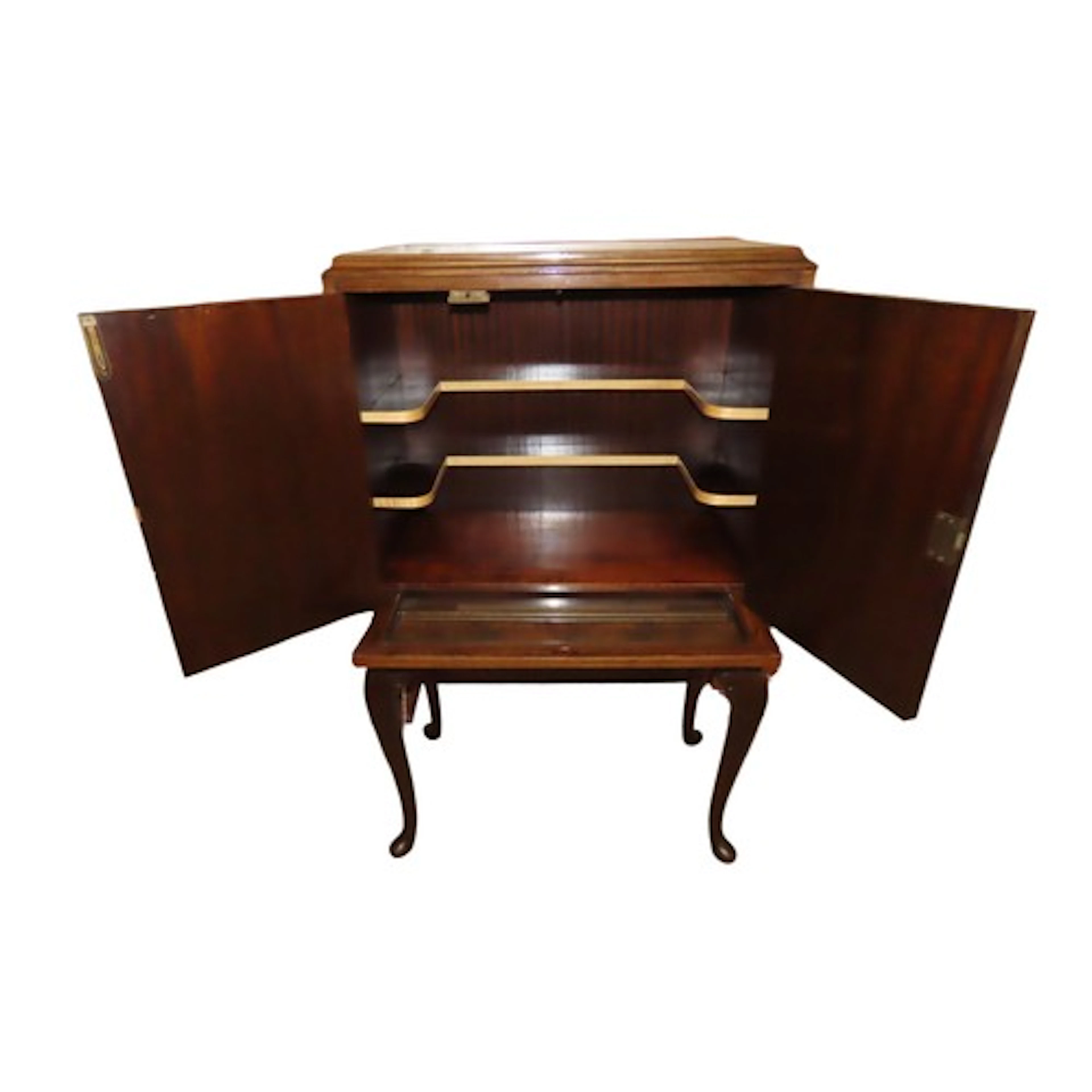 A reproduction walnut cocktail cabinet on stand, with brass ...
