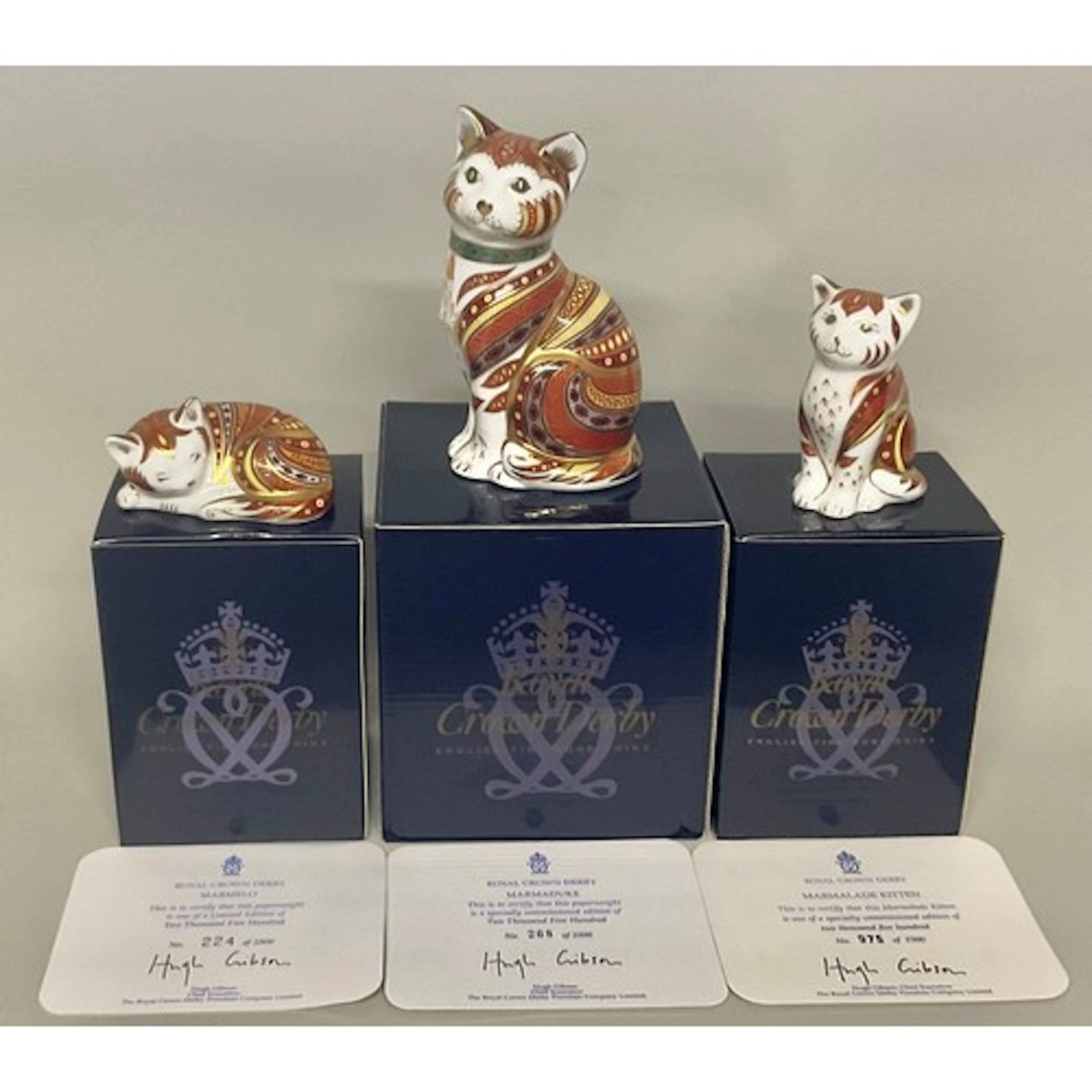 A Royal Crown Derby paperweight matched family group, compri...