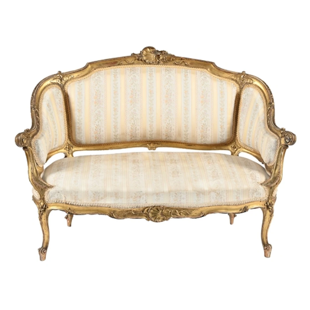 A French giltwood sofa, c1900, in Louis XV style, with stuff...