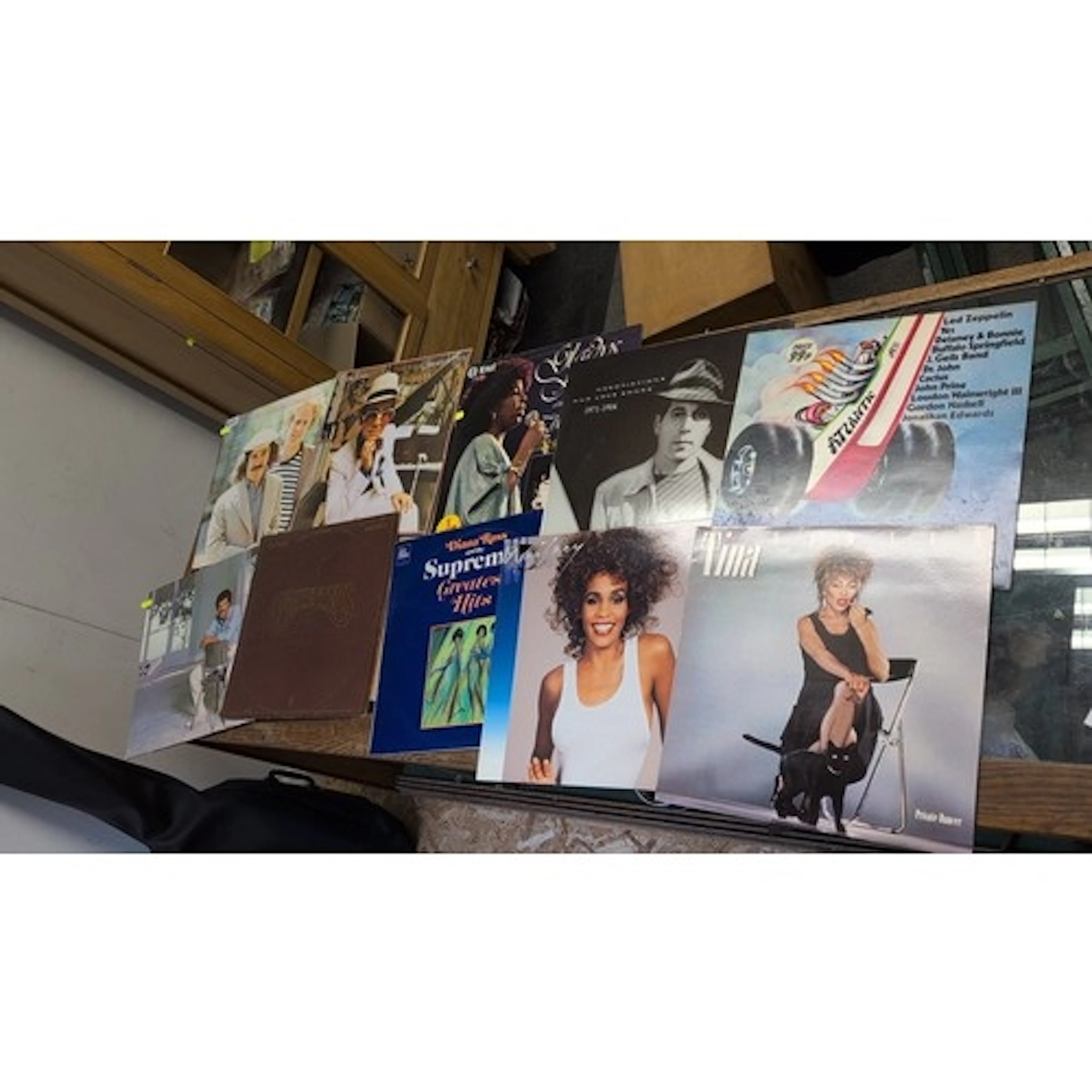 A group of popular music vinyl LPs and compilations, includi...